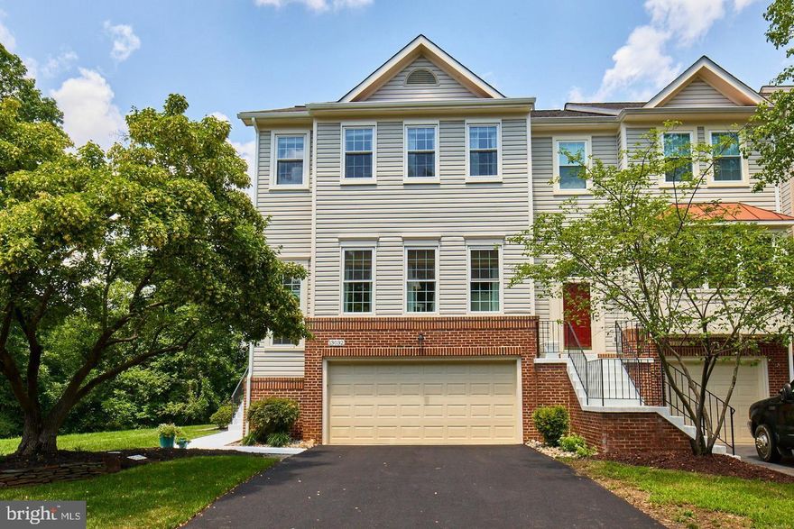 Well maintained and updated end-unit with views of trees and open common space, 2 car garage, 3 beds & 3.5 baths, Around 2,200 sf,  Hardwood floors throughout the main and upper levels, Walkout basement with full bath, recreation room and new carpet, a gas fireplace, and opens to a large, fenced-in patio, Extra Storage, Roof (2019) HVAC system (2019) Replacement windows (2020) Washer & dryer (2020) Hardwood floors on main, upper level & stairs (2021) New Driveway (2025) Community provides: community pool, pickleball court, and tot lot.  Don't miss this beatiful house.