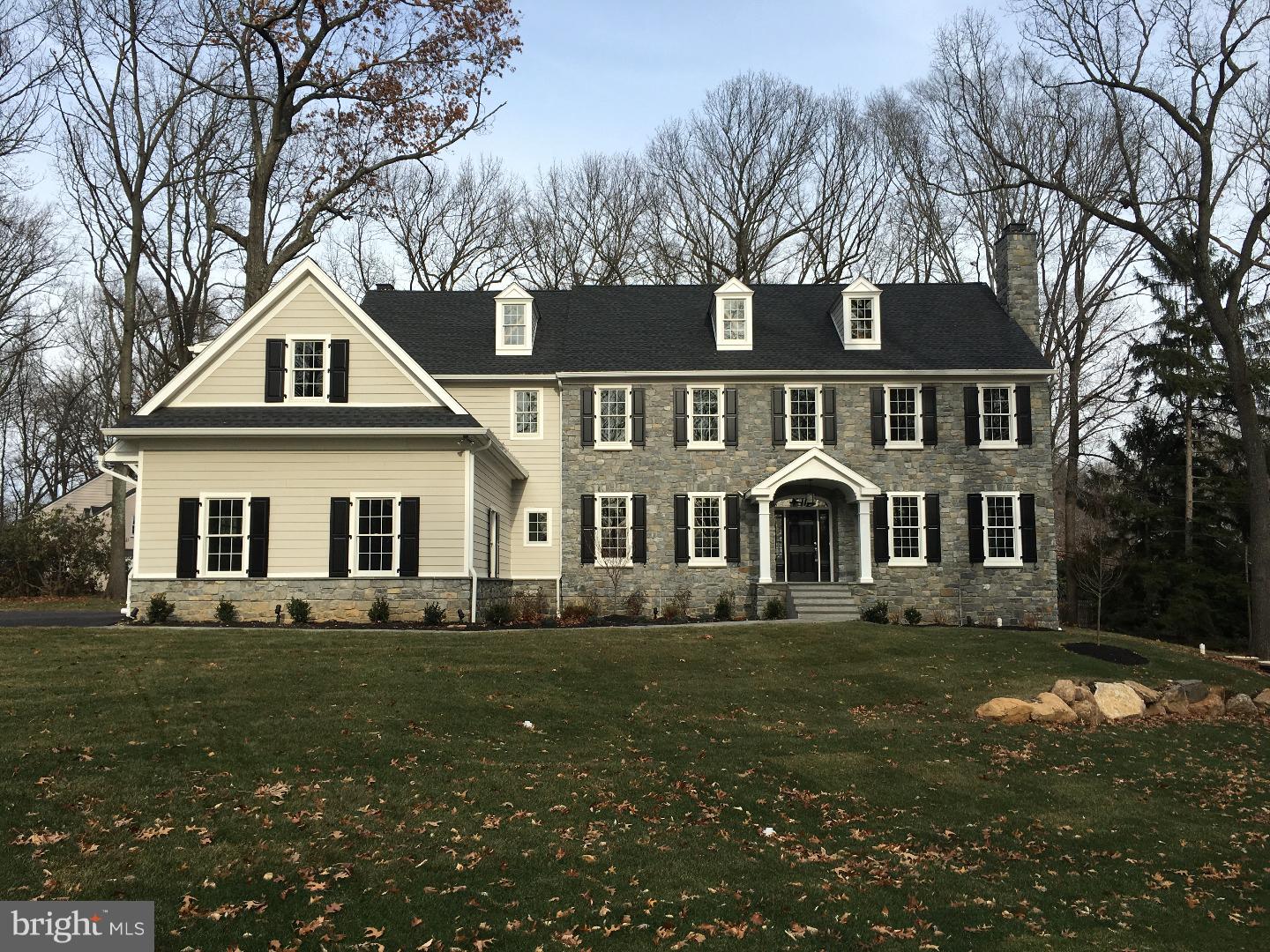 Introducing a luxurious new construction opportunity in the award-winning Radnor School District. Presented upon a corner homesite in Radnor, this custom-built home was artfully designed to combine classic Main Line architecture with modern interior design and amenities. Featuring 9' ceilings and generous room sizes, this center-hall plan creates elegant and inviting spaces in which to relax and entertain. Warm, walnut-stained quarter-sawn oak flooring extends throughout the living spaces and a neutral paint palette invites your creativity and personal touches. Designer details including custom millwork, wide baseboards, solid core doors, LED recessed lighting and modern fixtures provide unique accents in each space. Guests will be welcomed into a bright and gracious Foyer leading to french doors extending out to a flagstone patio at the rear of the home. Incorporating today's popular "open concept" design, the spacious Kitchen is truly the heart of the home, surrounded by a gracious Family Room and sunny Breakfast Room featuring cathedral ceilings and large windows. Highlights of the Kitchen include custom designed cabinetry by Brookhaven, Carrera marble countertops, a large center island work space with sink and two dishwashers, 48" Wolf gas range with vented hood, SubZero refrigerator, microwave drawer, and a sleek design-incorporating glass tile backsplash. A wet bar with built-in wine cooler is conveniently accessible from the Kitchen and Dining Rooms. The Family Room features a refined style accented by a coffered ceiling, gas or wood burning fireplace, and custom built-in shelving. Upstairs, the ultimate Master Suite awaits, featuring a relaxing sitting area, trey ceiling, his-and-her walk-in closets, and a spa-inspired Carrera marble bath with contemporary fixtures, soaking tub, and large shower with frameless enclosure. Three additional bedrooms, two full baths, a laundry room and large loft (or optional 5th Bedroom) complete the second floor. Offering plenty of room to expand, the full unfinished basement features daylight windows and rough-plumbing for a future powder room and a third floor loft is easily finished or utilized for storage. There is a large three car garage with wood carriage style doors. The superb location of this home provides easy access to popular Main Line locations, and very easy access to all major area roadways.