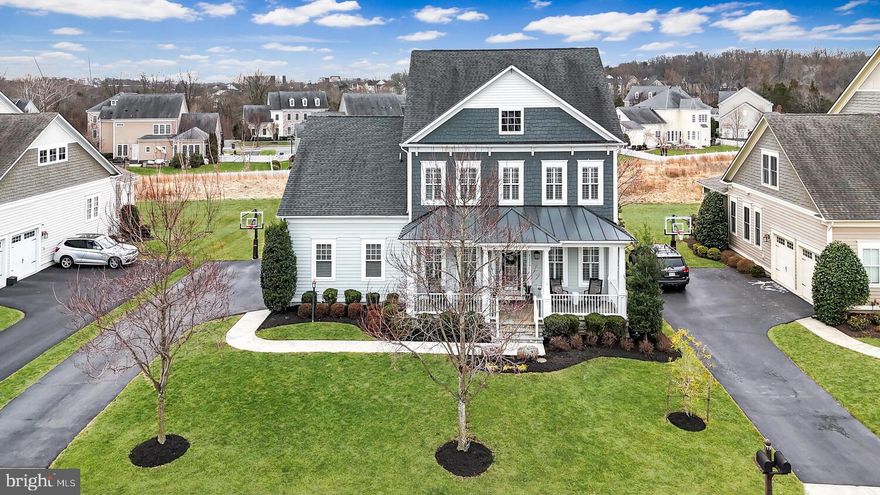 Welcome to this stunning expanded Chadwick model, a masterpiece of design and craftsmanship, perfectly positioned on a premium lot in The Grange at Willowsford—one of Ashburn’s most sought-after communities. Every detail of this exceptional residence has been thoughtfully curated, showcasing high-end upgrades, elegant architectural elements, and unparalleled attention to detail throughout.
<br><br>
Step inside to be greeted by gleaming hardwood floors that flow seamlessly throughout the main level, enhancing the home’s warmth and sophistication. The thoughtfully designed open floor plan creates a perfect balance of comfort and functionality, making both everyday living and entertaining effortless. At the heart of the home, the gourmet kitchen is a chef’s dream, boasting an expansive center island, top-of-the-line appliances, and an abundance of counter space and custom cabinetry—offering both style and practicality for culinary enthusiasts.
<br><br>
The family room radiates warmth and sophistication, featuring custom built-in shelving and a cozy gas fireplace that serves as a stunning focal point—perfect for intimate gatherings or relaxed evenings at home. Designed with both style and functionality in mind, this home also offers beautifully appointed formal living and dining rooms, ideal for hosting elegant dinners and special occasions. A private office, tucked away from the main living spaces, provides a quiet and inspiring environment for work, study, or creative pursuits.
<br><br>
Escape to the lavish owner’s suite, a true sanctuary of comfort and sophistication. This expansive bedroom offers breathtaking views, a serene ambiance, and ample space to unwind. The spa-inspired en-suite bathroom is designed for ultimate relaxation, featuring premium finishes, an oversized walk-in shower, and dual vanities. A custom-designed walk-in closet provides exceptional storage and organization, elevating everyday living. The upper level also boasts three generously sized secondary bedrooms, each thoughtfully designed for comfort, along with a conveniently located laundry room for added ease and efficiency.
<br><br>
The lower level is an entertainer’s dream, seamlessly blending style and functionality. This expansive space features a bright and airy recreation room, perfect for hosting gatherings, movie nights, or game days. A private fifth bedroom and a full bath provide an ideal retreat for guests or multigenerational living. With additional unfinished space ready for customization, there’s endless potential to create a home gym, media room, or hobby space tailored to your lifestyle. This level extends the home’s versatility while offering direct access to the patio and beautifully landscaped backyard, making indoor-outdoor living effortless.
<br><br>
Curb appeal abounds with meticulously manicured landscaping that enhances the home’s striking exterior. A charming covered front porch invites you to relax and take in the serene surroundings, while the expansive two-tiered stone patio—complete with a stunning fireplace—sets the stage for unforgettable outdoor gatherings. Thoughtfully designed for both beauty and convenience, the side-load garage not only enhances the home’s architectural elegance but also provides ample storage and functionality for modern living.
<br><br>
Perfectly positioned in the heart of Willowsford, this exceptional home offers unmatched access to the finest amenities in Northern Virginia’s premier community. With top-rated Loudoun County Schools, major commuter routes, upscale shopping, and thriving business hubs just moments away, convenience meets luxury in this coveted location. More than just a residence, it is a statement of refined living—where elegance, comfort, and modern convenience come together seamlessly. Don’t miss the opportunity to call this extraordinary estate home and experience the unparalleled lifestyle that Willowsford has to offer!