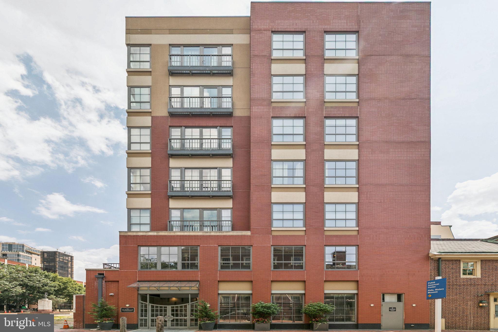 Experience timeless elegance and modern comfort in this beautifully updated bi-level condo, tucked within the prestigious Moravian Condominiums. Offering two bedrooms and one and a half baths, this spacious residence blends historic charm with contemporary finishes—perfect for those who love to entertain or enjoy vibrant city living.
Step into a welcoming tiled foyer with generous closet space and a convenient powder room. As you enter, you’re immediately greeted by a stunning brick archway that adds character and lets in natural light. The hallway leads to a chef-worthy kitchen featuring quartz countertops, a sleek tile backsplash, ample cabinetry, a gas cooktop, stainless steel appliances, and an oversized island—ideal for entertaining. A formal dining room flows into the inviting living area, where oversized windows, exposed brick, and a cozy gas fireplace create a warm and sophisticated atmosphere.
Elegant French doors open to a sun-drenched first bedroom, perfect as a serene guest retreat or sophisticated home office. Upstairs, the expansive primary suite is a true sanctuary, bathed in natural light and adorned with soaring vaulted ceilings and oversized windows. A spacious walk-in closet complements the spa-inspired en-suite bathroom, which boasts a deep soaking tub, a frameless glass-enclosed shower, and a sleek dual vanity—all designed for ultimate relaxation and refined comfort.
Situated in one of Philadelphia’s most desirable and walkable neighborhoods, this home is just steps from acclaimed restaurants like Zahav, Amada, Positano Coast, and Plough & the Stars. Just imagine Eagles game days surrounded by the city’s best bars and unmatched energy—all right outside your door.
With elevator access, a doorman, and a location that puts you near top dining, historic landmarks, and cultural attractions, this home delivers exceptional value in the heart of the city.
Don’t miss your chance to own this one-of-a-kind gem!