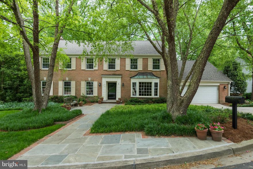 *RIGHT ON THE CRESCENT TRAIL.Stately home on most desirable street w/marvelous views of Parkland and the Trail.Superb Living and Entertaining spaces,recently refin.hardwood floors, freshly painted, large deck+ day-light walkout lower level Recr.Room,4 Bedrooms/3Baths on 2nd level, 2-car Garage on main level, In move-in condition and in a divine setting.