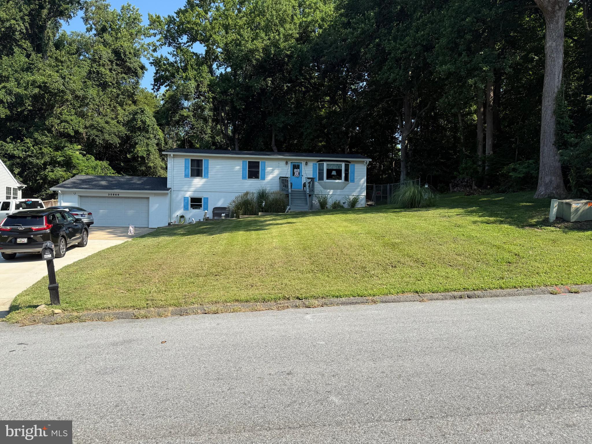 Very nice 4, BR, 3 Bath Rambler in Wicomico Shores. Main level with LVP flooring in living room, country kitchen and hall way. Living Room with Bay Window, Kitchen with granite countertops, stainless steel applicances. Sliding Door off of Kitchen to large deck, fenced rear yard and shed. Door off kitchen to side of home. Full Hall Bath with ceramic flooring Tub/Shower combo with ceramic tile. Primary Bedroom with Ceiling Fan and Medallion, Ceramic Shower, Ceramic Flooring. 2 more bedrooms. Lower level with Family Room with Ceiling Fan, Wet Bar, Laundry Room, Full bedroom with Ceiling Fan, Full Bath with Shower and Jacuzzi Tub. Off of family room is door leading to the 2 car garage with door that leads to the side of the home. Double wide driveway. Only minutes to the community pier, boat ramp and more. Neighborhood also has a restaurant at the golf course. Professional photos coming soon.