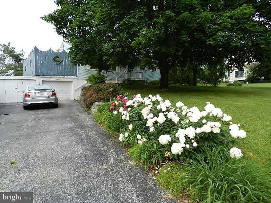 Enjoy living on a quiet side street in Lake Meade. A Private Gated Lake Community! Home Features: Vinyl Siding, Replacement Windows, Fenced Yard, Patio, 1 Car Garage, Off St Parking for 6 cars, Hardwood Floors through out, Gas Fire Place in LR, Large Eat in Kit, Updated Hall Bath w/ Handicap Shower, Stair Chair to Basement Rec Room w/ Dry Bar, Geo Thermal Heating & CAC!!! Community Amenities Include Lake Access, Pool, Rec Area's, Tennis Courts.