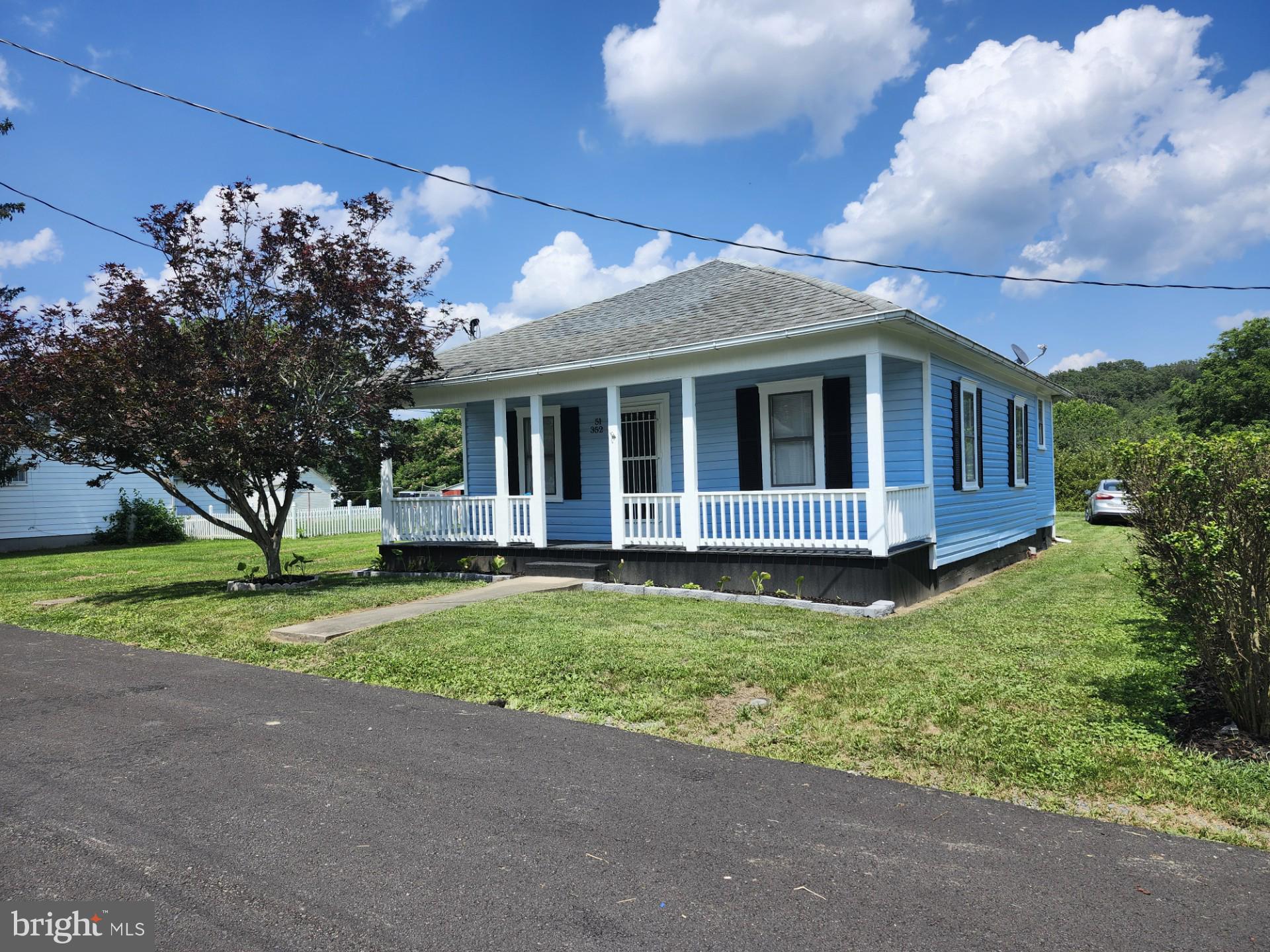 THIS NEWLY RENOVATED BUNGALOW IS NESTLED ON A QUIET STREET IN THE TOWN OF PAW PAW, WV! THERE IS A LONG LIST OF IMPROVEMENT'S ON THIS 2 BEDROOM, 1 BATH HOME, ALL NEW ELECTRIC SERVICE, UPDATED PLUMBING THROUGHOUT, NEW FRONT PORCH, BRAND NEW (HVAC) CENTRAL HEAT/AIR, NEW VINYL AND CARPET FLOORING THROUGHOUT THE HOME, AND THE COMPLETE EXTERIOR OF THE GARAGE HAS BEEN REPLACED WITH HARDIE BOARD! THIS COUNTRY CHARMER HAS ALOT TO OFFER, THE HOME HAS CITY WATER, CITY SEWER, AND HAS BEEN COMPLETELY INSULATED FOR A COST EFFICIENT INDOOR CLIMATE CONTROL! ALL OF THE UPGRADES HAVE BEEN TASTEFULLY DONE ON THIS HOME. THE HOME ALSO HAS A SUMP PUMP AND DEHUMIDIFIER IN THE PARTIAL BASEMENT.