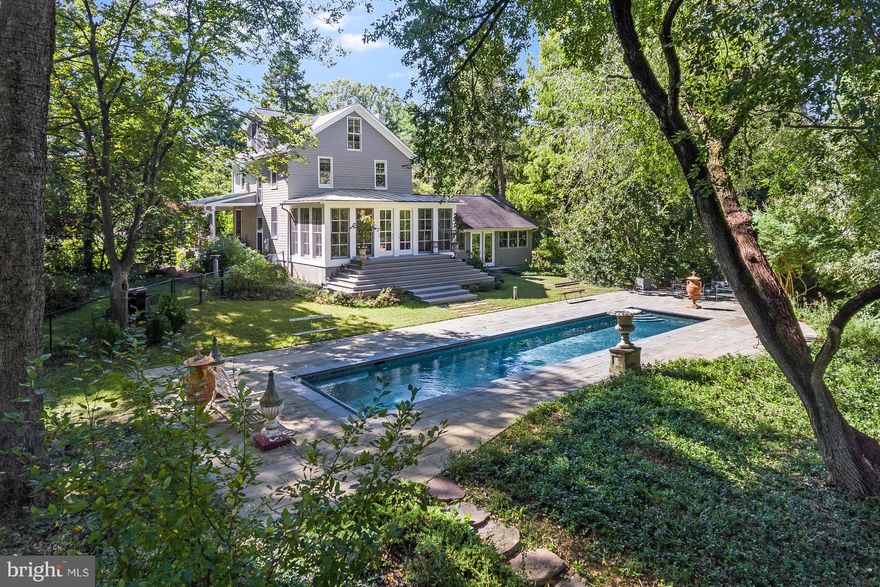 Lot 10 includes 4.66 acres with Farmhouse, pier, 110 ft of waterfront on Crab Creek, heated waterfront pool.