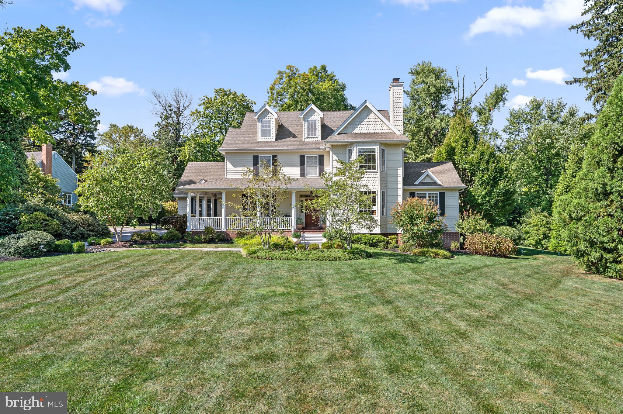 Welcome to 13 Kershaw Road, an exquisite home tucked away in the heart of Wallingford, where timeless elegance meets modern sophistication. This distinguished home spans 5,000 square feet, offering a harmonious blend of classic charm and contemporary luxury.
Upon entering, you are greeted by high ceilings that create an immediate sense of grandeur. The fabulous living spaces are adorned with crown mouldings and anchored by stately fireplaces, providing an inviting ambiance for both intimate and large gatherings.
The gourmet kitchen has 2 islands and allows for casual dining as well as space for entertaining family and friends! There is a light-filled breakfast area that is open to the family room complete with built-ins and a gas fireplace. Just off the kitchen is a fantastic mudroom, powder room, access to the 3 car garage and the expansive deck. There is a wet bar perfectly placed between the kitchen and formal dining room. Across from the dining room is the formal living room with floor to ceiling bookshelves, a wood-burning fireplace and access to the private first- floor home office.
Upstairs you will find five generously proportioned bedrooms and four meticulously designed bathrooms, this home ensures both comfort and privacy for its residents and guests. The master suite is a sanctuary of relaxation, boasting refined finishes and ample space. The walk-in closet is a room in itself and does not disappoint!
The finished lower level is a true showstopper and features a bar, living room, home gym, billiards area, a golf simulator and a full bath complete with a steam shower. This incredible space truly enhances the versatility of this exceptional home.
13 Kershaw Road is not merely a residence; it is a testament to refined living. Discover the perfect balance of elegance and comfort in this unparalleled property. The location is exceptional as it is walkable to the schools, the train, the library, the walking trails in Rose Valley and just a few miles from the Media Borough. This one is not to be missed!