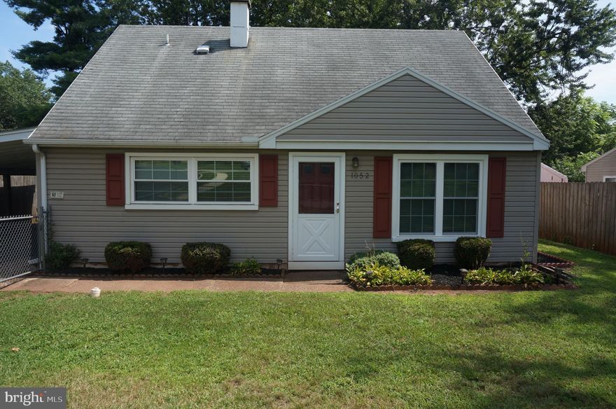 Great little bungalow nestled quietly in back of Oak Hills.  Move in ready or consider updating for a newer look.  Home has been freshly painted with new carpeting and flooring everywhere but kitchen.  Siding, roof, and windows are newer, and furnace just serviced in July 2025.  Front yard was fenced for a pet dog years ago, and backyard affords privacy with  board fencing.  Large rear shed plus rear closet accessed from rear of home offers valuable storage.  Carport is spacious and can be a covered patio for entertaining in warmer months.  Fry trust bills $9.00 annually for land lease.