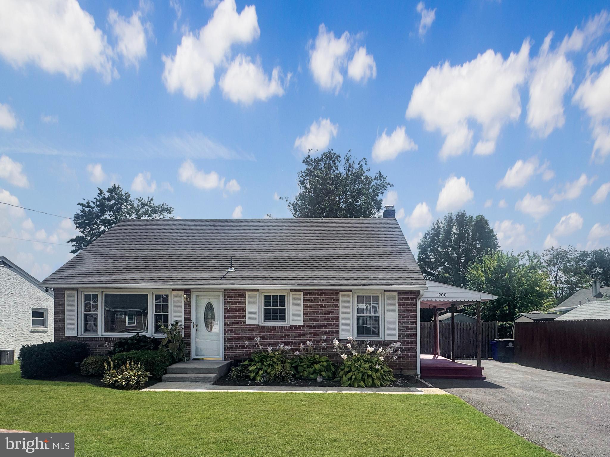 Look no further! This charming 3-bedroom, 1-bathroom brick Cape Cod home is an excellent opportunity for a first-time homebuyer, anyone looking to downsize, or even an investor seeking a move-in ready property! The first floor features gleaming hardwood flooring and freshly painted neutral tones that brighten the space perfectly! Enter the home from the convenient covered porch, situated next to an ample-sized driveway, to find a quaint breakfast nook and a functional galley kitchen! Continue through to the comfortable and spacious living room, which features beautiful hardwood floors and a large picture window -- letting in an abundance of natural light! Down the hallway you'll find the Primary bedroom, a second bedroom and a full bathroom complete with tile flooring and a shower/tub combo. Upstairs you'll find a sunlit 3rd bedroom -- make this space a bedroom, a playroom, a gym, home office, a man cave... the possibilities are endless! Outside enjoy a large fenced-in backyard, perfect for entertaining, gardening or letting your little ones play! This home is conveniently located near schools, shopping and major transportation routes. Schedule your showing today -- this home sweet home will not last long!