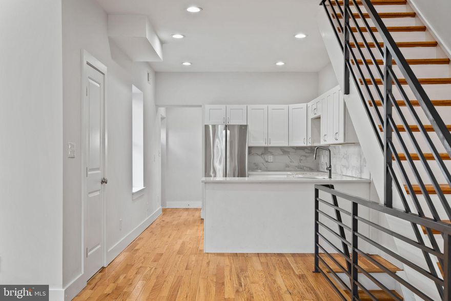 Incredible value at this fully-renovated home across the street from Strawberry Mansion High School! Enter to hardwood floors and a spacious living area which flows seamlessly from living room, through the dining area, and into the kitchen. White shaker kitchen with quartz countertops and stainless appliances (range and microwave still on order). Half bath on the main level for convenience. Oversized rear patio and side yard. Upstairs are three amply-apportioned bedrooms and a full bath with shower/tub. Full, finished basement. Convenient to SEPTA transit, I-76, Fairmount Park, and Center City Philadelphia. Schedule your private showing today!