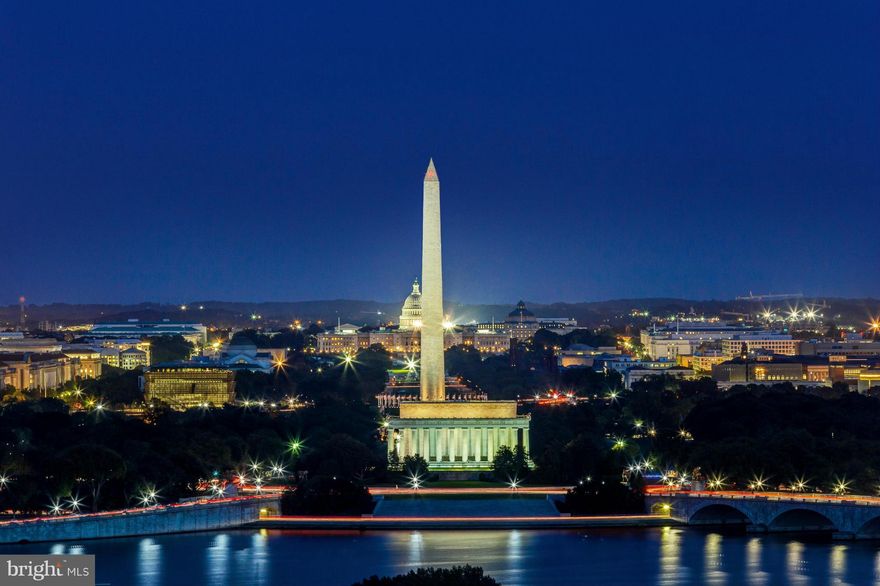 A RARE OPPORTUNITY TO OWN A FABULOUS 3 BR, 3 BA UNIT IN PROSPECT HOUSE, A LUXURY CONDOMINIUM, LISTED IN BEST ADDRESSES BY JAMES M. GOODE.  THIS UNIT IS BEAUTIFULLY RENOVATED, CONTEMPORARY & TOTALLY UNIQUE.- A 2 BR, 2BA  (1398 SQ. FT.) WITH  SPECTACULAR VIEWS OF THE D.C. SKYLINE, THE MONUMENTS & POTOMAC RIVER. CONNECTED BY SPIRAL STAIRCASE WITH A STUDIO UNIT (485 SQ.FT)  WITH KITCHEN & BATH & WESTERN EXPOSURE W/SUNSET VIEWS.   STUDIO CAN BE USED FOR GUESTS/OFFICE. THERE IS A SEPARATE ENTRANCE FROM THE STUDIO TO THE HALLWAY.  THE DRAMATIC LIVING ROOM WITH A 13 FOOT CEILING FEATURES A BUILT-IN LINEAR ELECTRIC FIREPLACE ON ONE WALL AND THE OPPOSITE WALL  IS LINED WITH A FLOOR TO CEILING CUSTOM DESIGNED WALL UNIT.  THE LIVING ROOM HAS A WALL OF GLASS DOORS OPENING TO A 20 FOOT TILED BALCONY SURROUNDED BY LUSH GREENERY & OVERLOOKING THE SPECTACULAR VIEW OF THE CITY, RIVER & MONUMENTS. SURROUND SOUND SYSTEM THROUGHOUT. REFINISHED WOOD FLOORING & NEW DOUBLE PANE WINDOWS THROUGHOUT. VERY LARGE BEDROOMS & ABUNDANT STORAGE. FULLY REMODELED KITCHEN & BATHS WITH HIGH END FINISHES.  ONE ASSIGNED GARAGE SPACE AND ONE OUTDOOR ASSIGNED SPACE CONVEY. UTILITIES & PARKING ARE INCLUDED IN CONDO FEE.AMENITIES INCLUDE 24 HR DESK SERVICE , SECURITY,  EXERCISE ROOM, BICYCLE ROOM , PARTY ROOM, OLYMPIC STYLE HEATED POOL & ON-SITE CONVENIENCE STORE/DRY CLEANERS.  CONVENIENTLY LOCATED 4 BLOCKS TO THE ROSSLYN METRO & MINUTES TO GEORGETOWN, AND DOWNTOWN DC. CLOSE TO JOGGING AND BIKING TRAILS. ONLY THREE MILES TO REAGAN AIRPORT & THE NEW AMAZON HEADQUARTERS. ENTERTAIN INSIDE IN YOUR BEAUTIFUL UNIT OR OUTSIDE ON YOUR SPACIOUS & PRIVATE BALCONY.  AN OPPORTUNITY TO OWN A VERY SPECIAL AND UNIQUE 1883 SQ. FT. UNIT.