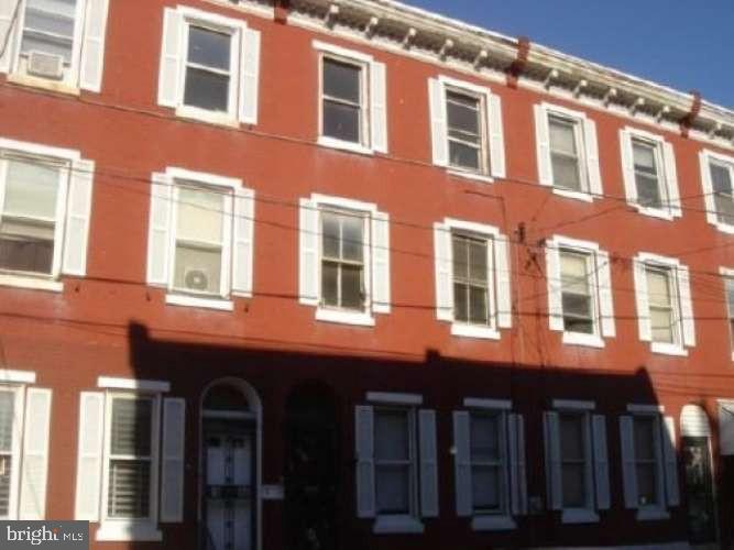 Lucrative Investment Opportunity near Temple University! Property is zoned RM-1 and can be converted to multifamily by right. This spacious 6 bedroom 2 full bath home is consistently rented for $3,300/month + utilities. 40% Return on Equity based on 25% down. The location of this home is highly sought after by Temple University students due to proximity to the school, recent renovations, and police station on the block. This home hardwood floors throughout, spacious bedrooms and historic charm. The large backyard is a plus. This unique building has been renovated but still has upward potential. Do not miss this opportunity to purchase this amazing rental. Property is being sold "As-Is". House is tenant occupied.