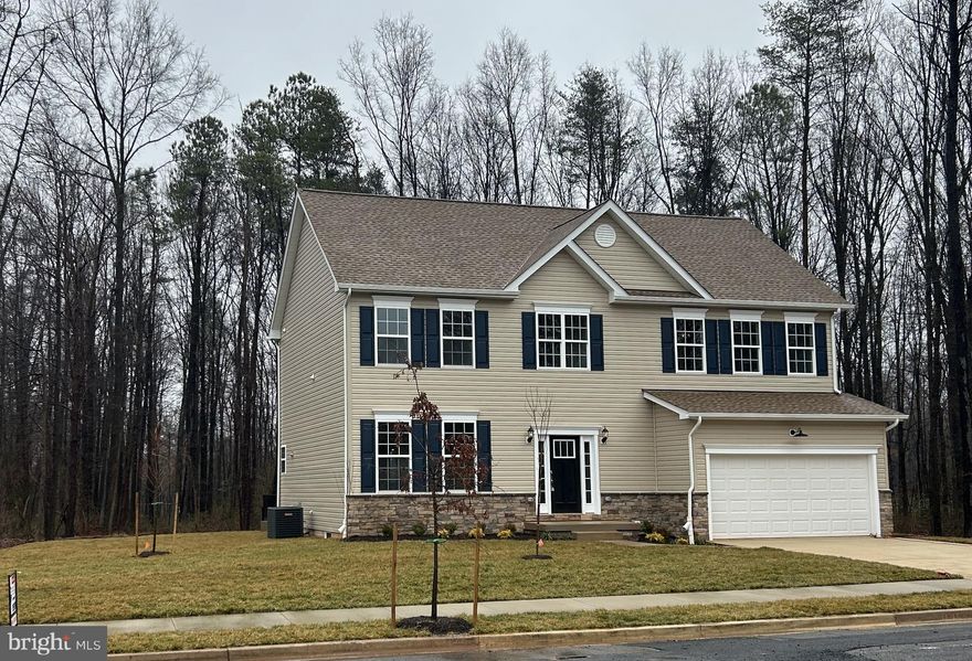 New construction to be completed in 2023! Home features a two-story entry foryer, formal living room and rear kitchen with Dining room and Family Room. The 2nd floor includes a spacious owners suite with two walk-in closets, linen closet and private bathroom with soaking tub, shower and dual sinks. Three secondary bedrooms, Laundry room and a shared hall bathroom complete the 2nd floor of the home.  Lower level can be finished with a 5th bedroom, bathroom and recreation room or purchase now and configure the lower level to your own design.   House is sited to include a 2-car front entry garage and a large wooded rear year! Location is 2.4 miles to the Seabrook MARC Train Station provides commuter access to Washington and Baltimore.  Purchase now and pick your custom interior and exterior finishes.   Permit is in process so house type can not be changed.