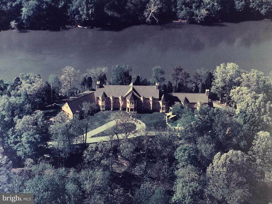 Hollow Hill Estate, Potomac Waterfront. Secluded.  63 Acres. 7500 +-sf. home on bluff, sited to provide views of the river. 1/ 2 mile wooded drive to house. Incl. oak floors, fabulous library, big kitchen w/ 1 of 6 fire places. windows;bay and bow, slate terrace, in-ground POOL,  Subdiv possible.  Family home, retreat, B&B, Nr. Shepherdstown, 15 mins to I-70/I-81  MARC, 50 Mi to DC/Baltimore.