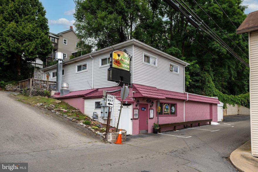 Imagine stepping out of Bellefonte and into Italy, This restaurant has been owned by three generations of Italians and has a triple AAA rating in their service of quality food and service to Centre County. Located about one-half of a block from the county courthouse and in the downtown area everyone knows this business. When you purchase this property you get all the real estate, the business with a great reputation, all the equipment to run the business, all of the chattel items and private parking lots. This offers you a turn key operation. With the profits the business brings in and the rent of $925.00 from the three bedroom apartment upstairs you can look forward to a good lifestyle. Call today for the brochure which includes a list of equipment and chattel items and the sellers disclosure form.
