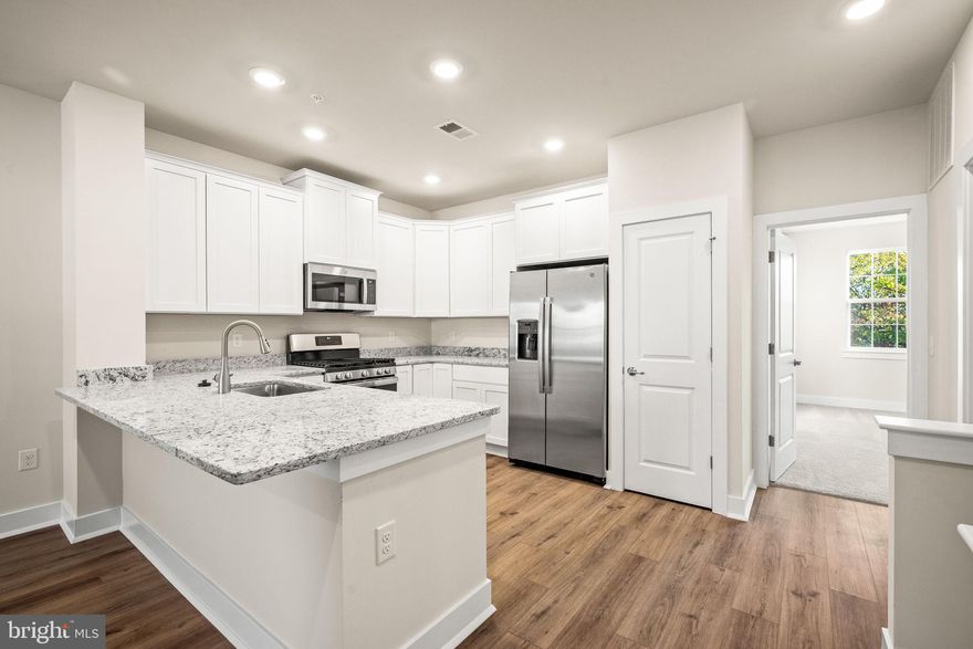 Builder is offering a special interest rate loan program of 3.99% on a 7 Year ARM! Ask for details! Subject to buyer qualification. Last Chance to Own New at Waterside! Don’t miss your opportunity to own the final new construction home at Waterside by Lennar Homes! This beautifully designed residence represents the best of modern luxury and convenience — and comes complete with Lennar Home’s 1-2-10 builder warranty, offering peace of mind for years to come. Step into a warm and welcoming foyer on the entry level, complete with a one-car garage that provides everyday convenience. From here, you can choose to take the stairs or ride your private elevator, offering a refined touch that makes daily living effortless. This home was built with accessibility and comfort in mind — ensuring that luxury meets practicality at every turn. The main living area is a seamless blend of style and function, featuring an open-concept kitchen, dining, and living space perfect for relaxing or entertaining. The chef-inspired kitchen is beautifully appointed with quality finishes and generous counter space, creating an ideal setting for culinary creativity. A laundry area conveniently located on this level makes household chores a breeze - no more carrying loads up and down stairs. The primary suite is a true retreat, complete with two spacious walk-in closets and a luxurious en-suite bathroom designed to provide comfort and tranquility. Also located on this level is a guest bedroom and full bathroom, offering flexible living arrangements and added convenience for family or visitors. Upstairs, an expansive loft area awaits — perfect as a cozy lounge, home office, guest retreat, or media room. A full bathroom on this level ensures comfort for everyone, no matter how you choose to use the space. This flexible design allows you to personalize your home to fit your lifestyle. Step outside your front door and experience all that Waterside has to offer. Stroll to the Waterside Café, a community favorite known for its delicious breakfast and lunch offerings. Enjoy the charm of a vibrant riverside community with easy access to parks, walking trails, and green spaces. Located in Bensalem, Waterside provides quick access to I-95 and is just 12 miles from Center City Philadelphia, making commuting and city adventures simple and convenient. The Delaware floor plan at Waterside by Lennar isn’t just a home, it’s a statement of modern design, comfort, and lifestyle. With its elegant layout, upscale finishes, and unmatched location, this final opportunity won’t last long. *Photos shown are of the actual home. **Special Financing Available: Lennar is currently offering a limited-time special interest rate, subject to buyer qualification and loan program. Please inquire for details!