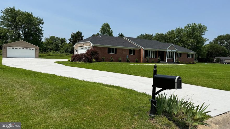 Amazingly remodeled, brick-fronted ranch home that sits on 2+/- acres in the C.R. School District, nestled quietly on a private road south of Camden.  This is a must-see property.  Entering the home, you are greeted with a luxuriously patterned tile floor that sets the tone for the balance of the tour.  The generously appointed kitchen features brand new, top-of-the-line LG stainless steel appliances, beautiful new cabinets, countertops, unique lighting, and elegant details. The bathrooms have both been updated for your discerning palate, with chic tile only adding to their stately appearance. Brand new roof with 30-year shingles.  The entire house has new modern flooring, sure to please the most astute eye.  The spacious 2,800+/- SF house boasts an attached 2-car garage and a detached 2-car garage, accommodating the newest she-shed, man-cave, painting studio, your hidden inner mechanic, or whatever suits your needs. New concrete driveway and the walkways and patio have been upgraded with beautiful. new pavers. The full basement is a very large usable space and could be finished at your leisure. Very nicely done.