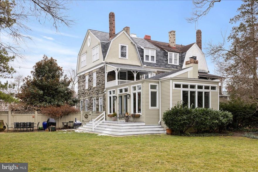 Welcome to 203 W. Highland Avenue, a charming oversized twin with wrap-around porch on double-width lot nestled in the heart of Philadelphia's prestigious Chestnut Hill. This meticulously maintained classic twin offers a perfect blend of historic charm and modern amenities, making it an ideal home for discerning buyers seeking elegance and comfort. Built in 1891 and lovingly maintained and updated, this house boasts 9+ ceilings, 4 fireplaces, 6 bedrooms, a primary suite with its own outside porch, sitting room, large closet and bathroom. Off the back of the house is a fabulous light-filled kitchen/great room addition that spills out to a large private fenced in yard beautifully designed with plants from past Morris Arboretum plant sales and perfect for al fresco dining and relaxation. There is off-street parking for 4 cars and house is in within walking distance of the shops and restaurants of Chestnut Hill, public transportation, Pastorious Park and the Wissahickon Valley.  A must see for those desiring a large home in a choice, top-of-the-hill location!