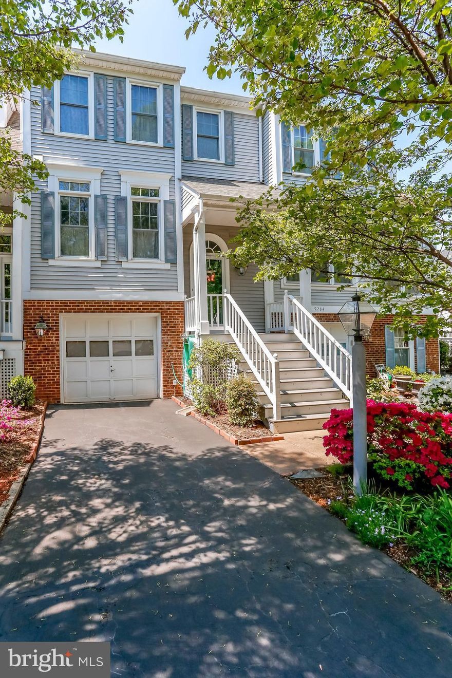 Beautiful  luxury TH featuring 2 story foyer, updated kitchen with new appliances/flooring/corian counters, step down LR with hardwoods & FP, MBR with vaulted ceilings, spa BA & 3 closet, spacious  secondary BRs, finished lower level RR with FP, new updated half bath, storage area & walkout to fenced yard & patio . Many updates:carpet, paint, appliances, windows, roof, hot water heater & more!