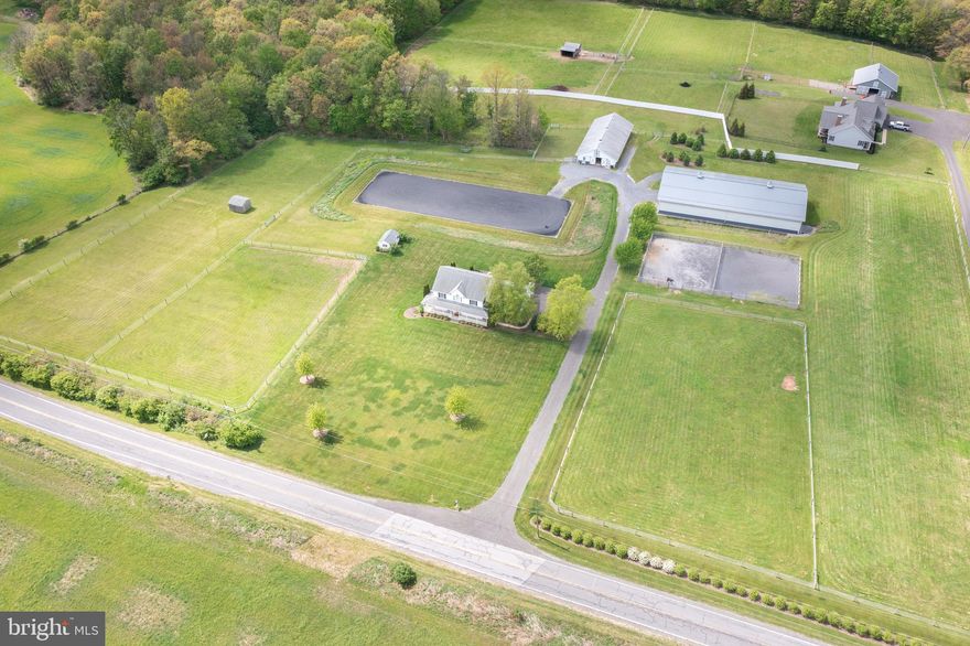 Set on 10.46 breathtaking acres in the heart of Centre Hall, 247 Greens Valley Road is a rare 
blend of luxury living, equestrian functionality and complete privacy. With panoramic mountain 
views, a custom‑built 4‑bedroom home, a professional 9‑stall barn, indoor and outdoor riding 
arenas, this property delivers a lifestyle that’s peaceful, scenic, and exceptionally well‑equipped. 
The barn features a heated tackroom, half bath, wash stall and loft for hay storage. Indoor riding 
arena 120ft X 60ft with kickboard, lighting and professional footing. Outdoor riding arena 200ft x 
66ft. Lots of fenced pasture, one run-in shed and two sand paddocks for muddy weather. 
Magical wooded area with hand made brush hedgerow. A true standout property ideal for 
boarding, training, personal equestrian use, hobby farming  or simply enjoying the scenery!