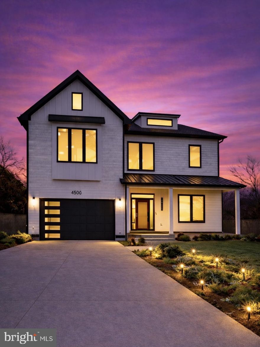 Defined by full-height Palladian glazing and layered entertaining spaces, this four-level modern residence is composed with scale, proportion, and precision.

Spanning approximately 6,000 finished square feet, the home is structured around volume and natural light. A clean-lined exterior with black-framed windows and standing seam metal roof accents establishes a confident contemporary presence, while a dramatic two-story foyer anchored by sculptural lighting introduces the architectural tone within.

Floor-to-ceiling Palladian glass frames the main level, drawing light across open living spaces designed for both daily function and elevated entertaining. A dramatic full-height stone fireplace wall anchors the living room. The kitchen centers on a fluted waterfall island with mixed cabinetry, brass accents, pot filler, curated lighting, and integrated surround sound.

The primary suite operates as a private retreat with its own fireplace and a spa-level bath featuring refined stone finishes, freestanding soaking tub, and frameless glass enclosure.

The fully finished fourth level presents a rare lifestyle offering — a private lounge with wet bar and full bath opening to a covered rooftop veranda with fireplace.

The walkout lower level operates as a fully independent living environment, complete with kitchenette, bedroom, full bath, dedicated movie theater or private fitness studio, expansive recreation lounge, and exterior access.

Three fireplaces. Four finished levels. Whole-home audio. Two-car garage.

Positioned minutes from Downtown Bethesda, NIH, Walter Reed National Military Medical Center, Suburban Hospital, and Bethesda Row, the residence offers architectural scale with immediate access to the region’s premier medical and lifestyle centers.

Modern. Composed. Intentional.