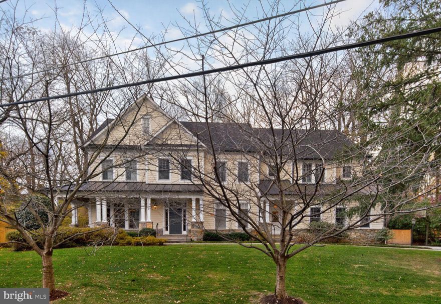 This impeccably designed home makes an immediate impression with refined finishes and thoughtful details throughout. The main level offers a private home office, elegant sitting room, and a butlers pantry with wet bar and wine refrigerator, perfect for entertaining. The open gourmet kitchen features marble countertops, stainless steel appliances, a coffee bar, and a sunlit breakfast area overlooking the backyard and pool. An inviting living room with stone fireplace completes the space.<br>

An elevator serves all three levels. Upstairs, four spacious bedrooms plus a luxurious primary suite await. The primary retreat includes a fireplace, expansive walk-in closet, and spa-like bath with soaking tub and separate shower. Two additional en suite bedrooms with private baths, a fourth bedroom, office and laundry room complete this level.<br>

The finished lower level includes an additional bedroom, full bath, gym, and stylish bar. Outside, enjoy a private backyard with a large heated pool and pergola. Located in a beautiful Bethesda neighborhood, this exceptional home offers elegance and comfort.