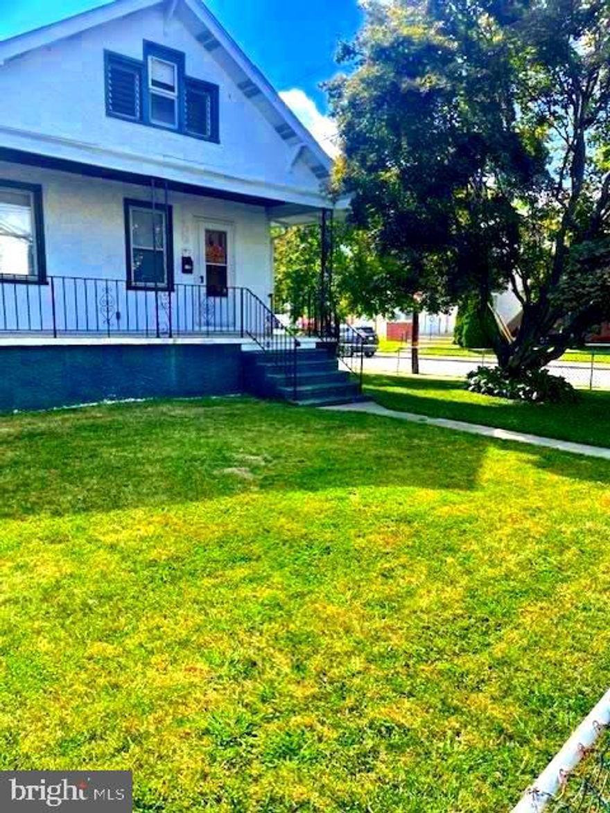 Opportunity knocks!!   Back on the market after Buyer financing fell through.
Welcome to one-story living in this attractive corner bungalow home with off-street parking thanks to its 2-car driveway.  
Move right into this well-located charmer with plenty of interior closet space.  If ease of living is your goal, then this is a must-see!
Enter from the front porch into the living room with windows for enjoying the front & side yard views.
The first bedroom is to the left of the living room.
Following the living room is the eat-in kitchen , also with windows looking out onto the side yard.
The bathroom and a cute 'nook' area that can be a main-floor laundry or pantry are behind the kitchen. The spacious second bedroom is at the rear . 
 Just 5 steps down to the basement which can be used for storage or recreation.
Relax on the covered front porch and enjoy gardening , exercising or entertaining in the large front & side yard.  There is an attic for storage and the bonus shed in the rear also provides additional space.