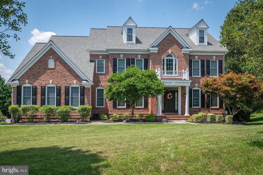 Welcome to this stunning residence nestled in the serene neighborhood of Cattail Ridge. This magnificent home offers an exquisite blend of contemporary design, luxurious amenities, and a picturesque location, creating an unparalleled living experience.

You'll be captivated by its elegant curb appeal and manicured landscaping. Step inside to discover a thoughtfully designed floor plan spanning across two levels, boasting approximately 4200+ square feet of living space.

The main level features an inviting foyer, leading you to the heart of the home—the expansive living area. Bathed in natural light, this space offers a seamless flow between the living room, dining area, and gourmet kitchen, making it ideal for entertaining friends and family. The kitchen is a chef's dream, equipped with top-of-the-line stainless steel appliances, ample cabinetry, a center island, and a breakfast bar and many, many upgrades. 

Adjacent to the kitchen, you'll find a cozy family room with a fireplace, creating the perfect spot to unwind and relax. French doors lead you to a covered outdoor patio, where you can enjoy al fresco dining or simply soak in the tranquility of the surroundings.

The upper level hosts the luxurious master suite, featuring a spacious bedroom, a walk-in closet, and an ensuite bathroom with dual vanities, a soaking tub, and a separate shower. Additionally, there are three generously sized bedrooms, each with its own en-suite bathroom, providing comfort and privacy for everyone in the household.

This remarkable home also includes a finished basement, which can be utilized as a recreation area, home theater, or fitness space—the possibilities are endless. There is also a separate guest suite with a full bathroom, perfect for accommodating visitors or creating a private home office.

The outdoor space is an oasis of tranquility, featuring a lush lawn, mature trees, and a professionally landscaped yard. The expansive backyard offers plenty of room for outdoor activities and the potential for creating your own personalized outdoor retreat.

This home provides a peaceful suburban setting while still being within close proximity to major commuting routes, shopping centers, and recreational amenities. You'll have easy access to renowned schools, parks, golf courses, and other attractions. 

Don't miss the opportunity to own this exceptional property. Schedule a showing today and experience the epitome of luxury living in Glenwood MD.