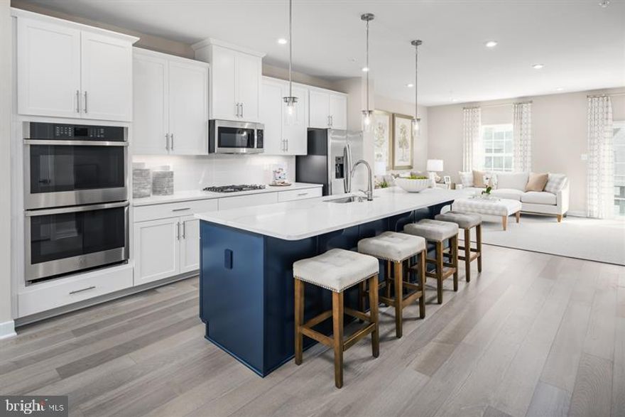 THIS JANUARY MOVE-IN HOME WILL INCLUDE :Monroe Designer Interior Package, Quartz Iced White Countertops, Stainless Appliances with Gas Cooking, Ceramic Bathrooms, Ceramic Laundry Room, 3-Piece Plumbing Rough-In, 18'x8' Composite Deck, Additional Lighting, Smart Thermostat,
Wifi Garage Door Opener, Tankless Hot Water Heater ! The Schubert, at the largest of the Composer II series homes, offers the space and customizing details of single-family living with the convenience of a townhome. On the main living level, you're greeted by an enormous and airy kitchen with a huge island perfect for entertaining. The dining room provides space for a more formal meal while the great room is perfect for movie night evenings at home. Up a flight of stairs designed to be elegant and functional, the upper level boasts three bedrooms, two baths, and a full sized 2nd floor laundry with extra shelf space and an optional laundry tub. No need to worry about storage space ,A generous closets abound in both bedrooms. The Primary's Bedroom is a private retreat accented with an optional tray ceiling and featuring an enormous walk-in closet. The Primary Bath boasts a soaking tub and separate shower with seat and a dual vanity for the ultimate in convenience. Several lower level floor plans are available depending on community. Photos are Representative. Lot Premiums may apply.