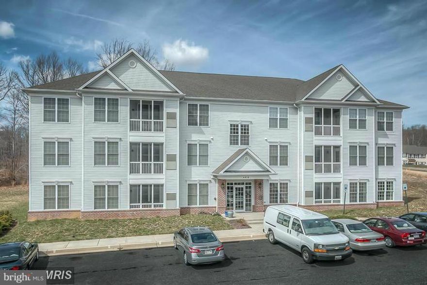 Top floor ELEVATOR condo in Hollywoods! 9' and vaulted ceilings, wood floors, upgraded carpet, 42" kitchen cabinets.  All appliances included w/gas heat and tankless hot water. Private screened porch backs to trees. Family room and breakfast area off kitchen, Master Bath with built in makeup table and walk in shower with seat. Walk in master closet.  Avaliable end of November.  Convenient to APG.