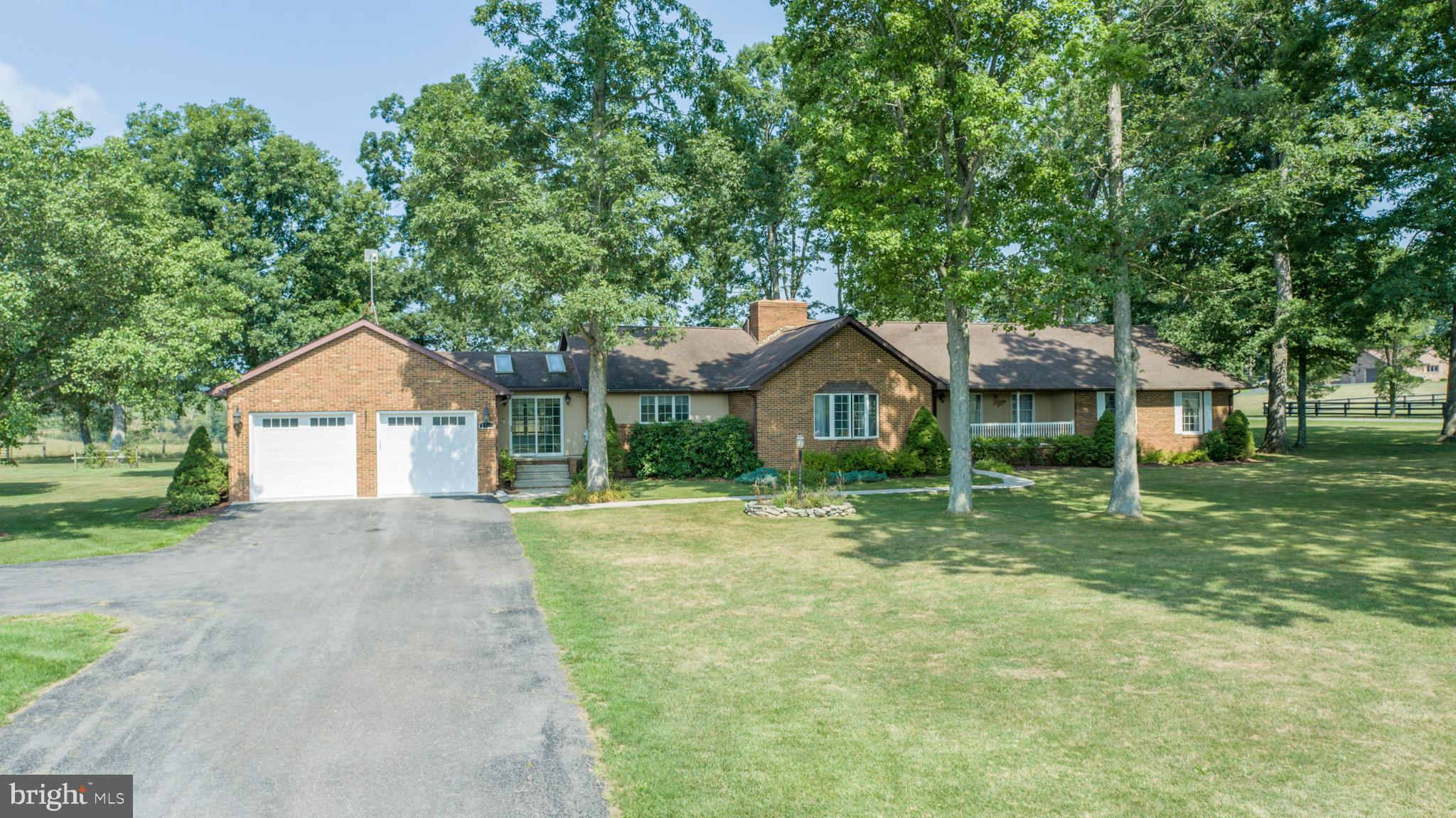 Stunning Brick Ranch Near Broadford Lake Park! This magnificent one-level brick ranch sits on a level 1.5-acre lot backing to scenic farmland and walking distance to Broadford Lake Park. The 3,600 sq. ft. floor plan includes a master suite with a private bath, his & her closets, custom tiled shower, and granite vanity tops.The recently remodeled kitchen features granite countertops, an oversized island with bar seating for seven, a farm basin sink, and stainless steel appliances. Enjoy multiple living spaces, a separate dining area, a light-filled sunroom, and a covered back porch offering a peaceful setting. Additional highlights include a partially finished basement with a recreation/game room and 2,600 sq. ft. of storage, plus a two-car attached garage.Call today for your personal tour!