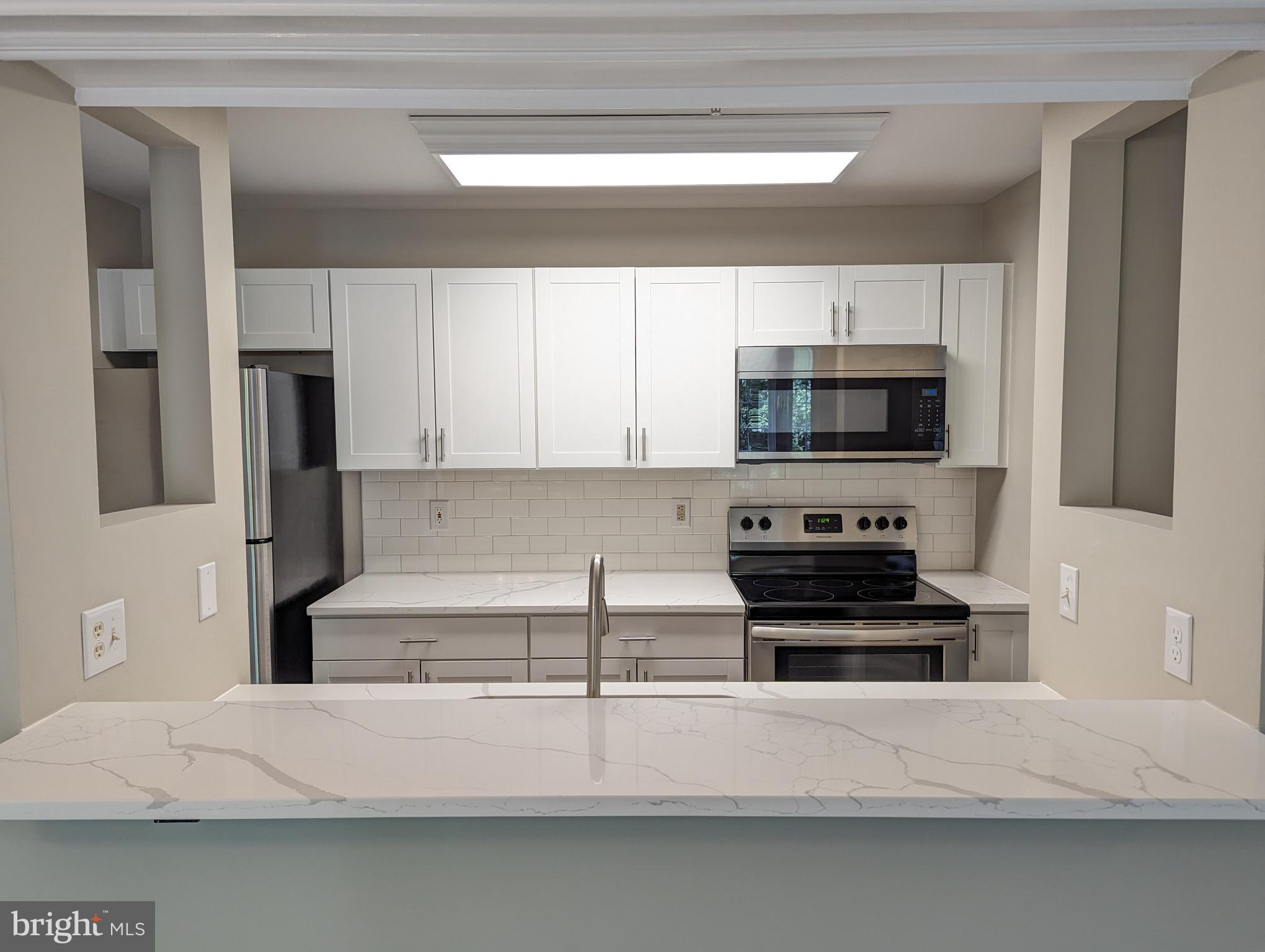 Beautifully updated condo in the sought out subdivision of Oak Leaf Villas! This home boasts all new windows, new sliding glass doors, new white cabinets, new stainless steel appliances, gorgeous quartz countertops, new paint, all new flooring throughout including maintenance free LVP flooring, new carpet in bedrooms. Updated bathrooms, private balcony overlooking the wooded area. Wood burning fireplace, open floor plan, close to all major shopping centers and highways.