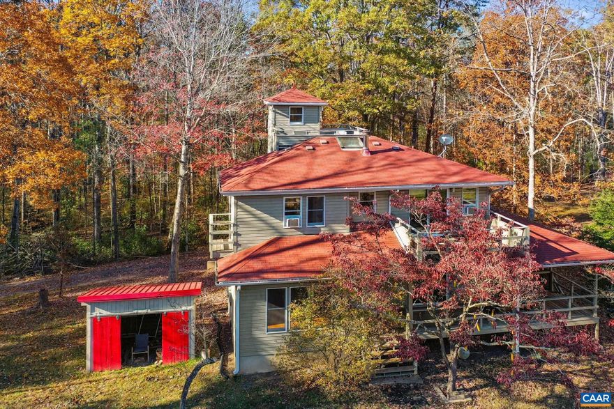 Incredible opportunity to own a very quiet private retreat on  60 acres - convenient to historical Culpeper for dining, shopping, cafes, wineries and breweries. Incredibly private and not far from the Blue Ridge Mountains but yet not too far from DC and Northern VA. Contemporary, custom-designed home sits atop a cleared hill looking over a valley and private pond (with bass). Spend your weekends, summers and holidays here, make it your permanent home, or make it whatever you wish. You will delight in nature, beauty and serenity. Includes a large detached garage and a split log building. There are deer in the woods, fish in the pond, and plenty of room for you to cultivate, explore and relax. Hurry and don't miss this once in a lifetime chance to buy a piece of paradise and start making lifetime memories.,Tile Counter