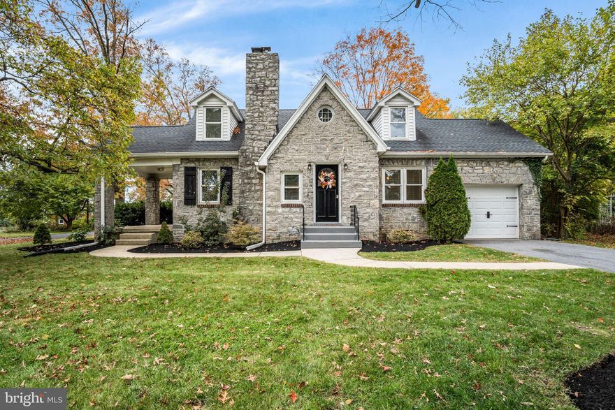 Nestled in the charming Point Ridge Farms neighborhood, this delightful Cape Cod home exudes warmth and character. Built in 1946 and thoughtfully renovated in 2010 with updated Electric, Windows & Central AC, it seamlessly blends classic charm with modern conveniences. The exterior showcases a beautiful combination of stone and vinyl siding, complemented by well-maintained landscaping on a generous 0.37-acre corner lot. Step inside to discover a spacious layout with three inviting bedrooms and two full bathrooms.  Featuring a first floor Bedroom & Bathroom.  The heart of the home is the cozy living area, highlighted by a stunning stone fireplace that creates a perfect gathering spot. The kitchen is equipped with essential appliances, including an electric oven/range, refrigerator, built-in microwave, and dishwasher, making meal prep a breeze. Enjoy the convenience of an unfinished basement with heated access, ideal for storage or future customization. The property also boasts an attached garage and ample off-street parking, ensuring plenty of space for guests. Outside, the level yard offers a front yard, rear yard, and side yards, perfect for outdoor activities or gardening with a beautifully crafted Quaker Storage Shed. A charming covered porch invites you to relax and enjoy the serene surroundings. The neighborhood is conveniently located providing easy access to local amenities, parks, and shopping.  Experience the comfort at your own private neighborhood park reserved for the members & families of the community of Point Ridge Farms today! This home is not just a property; it's a place where memories are made.