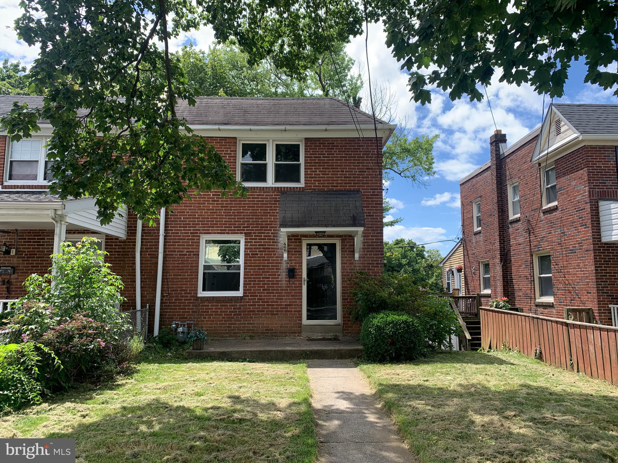 Nestled in the charming neighborhood of Drexel Hill, this Brick colonial twin home offers a perfect blend of classic elegance and modern comfort. This home has been well maintained and updated, that invites you to experience a lifestyle of peace and ease. Step inside to discover a thoughtfully designed interior that exudes warmth and style. The living area features laminate plank flooring that flows seamlessly throughout, creating a cohesive and inviting atmosphere. The NEW kitchen is a culinary enthusiast's dream, boasting new white cabinetry, spacious, upgraded countertops, new built in appliances, tile backsplash that elevate both functionality and aesthetics plus a refrigerator. Imagine hosting intimate gatherings or enjoying casual meals in this combination kitchen/dining room, where every detail has been curated for your enjoyment. The home features three nice sized bedrooms, each offering a serene retreat for relaxation. The full bathroom is a sanctuary in itself, complete with a tub/shower that invites you to unwind after a long day. Ceiling fans throughout the home ensure a comfortable climate year-round, enhancing the overall ambiance of this charming residence. Venture outside to the private patio, where you can bask in the tranquility of the surrounding trees and woods. This outdoor space is perfect for morning coffee or evening gatherings, providing a peaceful escape from the hustle and bustle of daily life. The basement is accessible from both the interior and exterior, offers possibilities for customization-whether you envision a home gym, a playroom, or additional storage, the choice is yours. With a walkout level that leads directly to the rear driveway, this space seamlessly integrates indoor and outdoor living. Parking is a breeze with an attached garage and additional driveway options, ensuring convenience for you and your guests. The new driveway adds to the home's appeal. This property is not just a home; it's a lifestyle. Experience the perfect balance of comfort and elegance in a community that values both charm and convenience. With its prime location and new features, this residence is a rare find that promises to elevate your living experience. Don't miss the opportunity to make this exceptional property your own-schedule a private tour today.