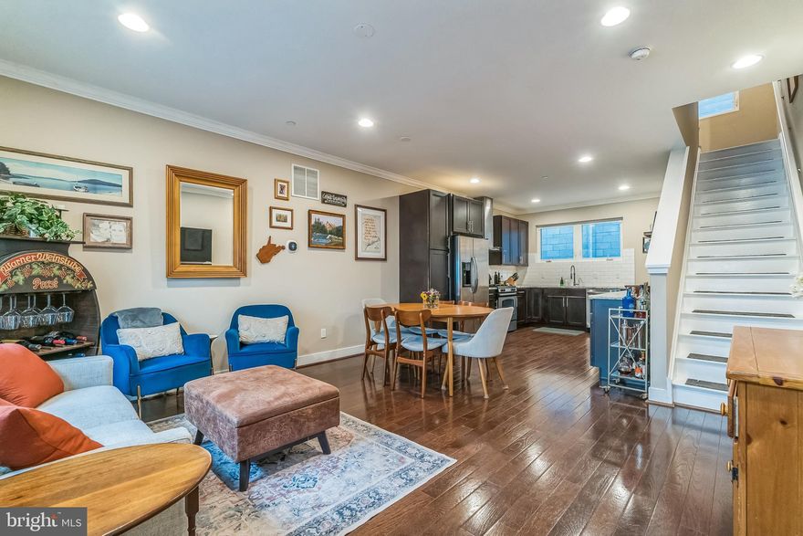 Modern Living in the Heart of Northern Liberties with Deeded Parking and Roof Deck Views

This Northern Liberties townhouse is stylish, spacious, and perfectly situated in one of Philadelphia’s most vibrant and sought-after neighborhoods. This 3-bedroom, 2.5-bath home blends thoughtful design with modern convenience, offering an ideal city living experience--with the rare luxury of covered parking.

Located just steps from the best of Northern Liberties — including neighborhood staples like Cafe La Maude, Standard Tap, Suya Suya, Middle Child, and Schmidt's Commons (the Piazza to everyone else). Very close to gyms like City Fitness and yoga studios like Tuck Yoga. Coming soon: Amazon Fresh and Sprouts. You’ll easily access top-rated restaurants, coffee shops, boutiques, and parks. It's a quick commute to Center City and major highways.
Step inside to an open floor plan featuring a bright living and dining area that flows into a well-appointed kitchen. Enjoy Shaker-style cabinetry, granite countertops, a built-in microwave, wine fridge, and abundant storage, all accented by a classic subway tile backsplash. There are nicely updated features like new custom trim around the front window and door. 
The second floor includes two light-filled bedrooms and a hall bathroom with a tub. Upstairs, the entire third floor is your private main suite. The spacious bedroom includes generous closet space, custom built-in cabinetry, and splashy wallpaper. The en suite bath boasts dual vanities, heated flooring, a chic accent wall, and a calming, spa-like feel.
Outdoor space is a highlight with a private rear patio and an incredible roof deck featuring panoramic views of the city skyline and the Ben Franklin Bridge. The roof deck has a new silicone finish that is under warranty. 
Need more space? The finished lower level offers a flexible bonus area with a stylish half bath and laundry — perfect for a home gym, media room, or play area.

This home truly has it all — location, style, and amenities. Schedule your tour today and fall in love with life in Northern Liberties