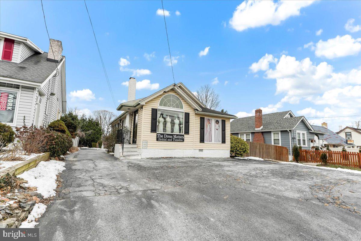 This high visibility building is located on a heavily traveled road in Upper Providence Township, Rose Tree Media school district. This 1986 square foot standalone building has off street parking for 7 to 8 cars. The 1st floor offers a reception area with decorative brick fireplace, waiting room, 5 separate private rooms. These rooms are perfect for private offices, 1st floor powder room and kitchen area. The 2nd floor offers a private office and either a lunchroom or meeting room. The lower level offers a full finished basement with laundry room, powder room, separate stall shower and also can offer additional office space and storage areas. The HVAC system is gas hot air heating and central air conditioning. This is a perfect building for almost any business and may be ideal for a Law Practice, Accounting Firm, Insurance Agency, Medical Building, consulting Firm, Real estate office and Nail Salon. Many great uses!