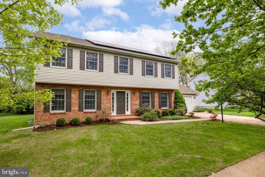 Create a lifetime of memories in this beautiful Oakpointe two-story home. A lovely entrance welcomes you, setting the tone for the quality finishes throughout. Original hardwood floors grace the main level complemented by an abundance of closets and oversized windows that allow natural light to fill every room. At the heart of the home is a functional kitchen with sliding doors that open to a cozy patio area and a backyard, complete with a fenced-in garden. The kitchen seamlessly connects to a dining area and family room, which features a cozy fireplace. The spacious living room, also on the main floor, provides additional room for gatherings and relaxation. A half bath and laundry room round out the main level. Upstairs, you'll find a primary en suite featuring a tiled bathroom with dual sinks and a Jacuzzi tub. The upper level also includes three additional bedrooms and a full bath, completing the space. The unfinished basement offers ample storage space and additional room to customize as needed. The home also features a newer roof with solar panels, keeping the monthly electric bill around $10, along with a newer HVAC system for added comfort and efficiency. Residents of this peaceful neighborhood enjoy a convenient location, with easy access to amenities such as shops, restaurants, parks, and more. Two-car garage. $3,000 carpet allowance is included.