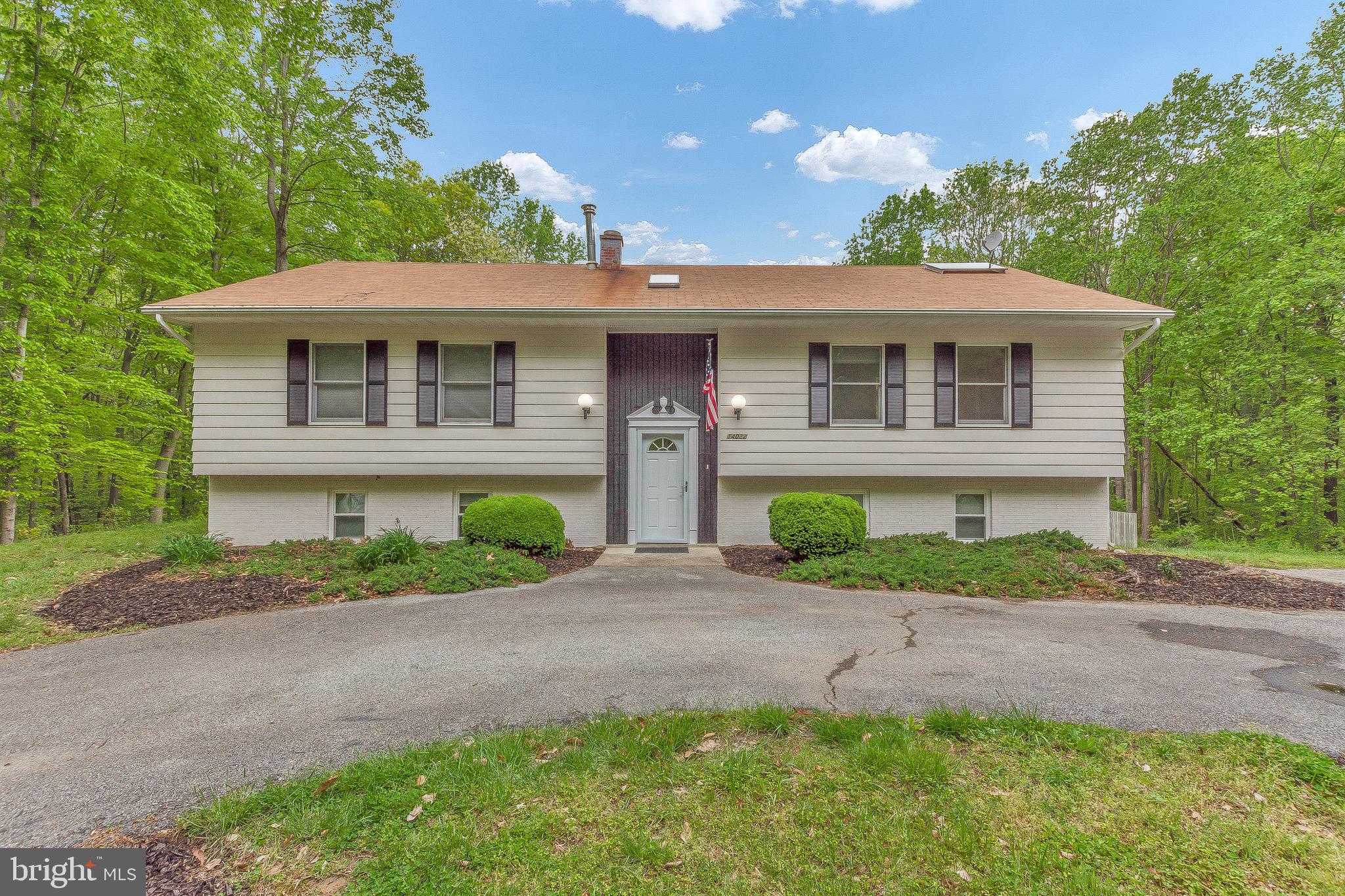 Over 5 acres of land included in this very well maintained property. NO HOA. Close to RT. 5, it's an easy commute to D.C. The house features 3BR with a spacious Master suite featuring an en-suite Master bathroom w/walk-in closet. New carpet installed on upper level. Two additional bedrooms and another bonus room on lower level. Wet bar/family room on lower level.The trek deck overlooks a fenced-in back yard that features an in-ground pool and brick BBQ. There is an oversized 2 car detached garage (approx. 27x23 parking area) with two additional rooms and 1/2 bath (think home based business or mechanic). There is a large clearing leading into the wooded area with a natural stream. There are so many ways to enjoy this property! MUST SEE in every sense of the phrase. Call Rich for a private showing today.