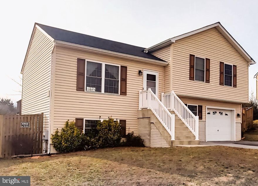 Inwood meadows, split level home with three bedrooms and three bathrooms and one car garage. House has finished basement with full bathroom and walkout to a private fenced in backyard, perfect for your pets. Location is close to I-81, perfect for commuting, and many restaurants in Inwood. Also close to Charles Town racing for your entertainment needs.