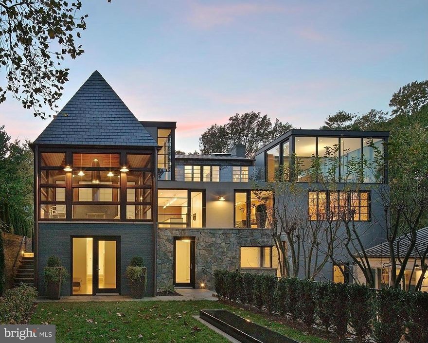 Architect Robert.Gurney, whose work is among the most coveted in D.C., designed this house as a sympathetic melding of the original with the contemporary. A modern masterpiece finished with beautiful materials incl. limestone, beech, teak & rosewoods, perfectly executed. Smart-home with controlled security, utilities, lighting & entertainment, and attached heated pool house w/stunning hardscaping.