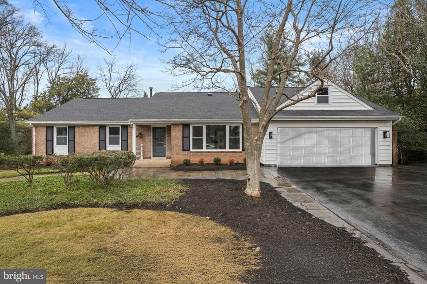 Nestled in the heart of the highly sought-after Sherwood Forest community, this exceptional, beautifully renovated colonial offers the perfect blend of comfort, style, and convenience. Set on a lush 0.41-acre lot with over 3,200 square feet of finished living space, this sun-filled home is truly move-in ready, with every detail thoughtfully designed for modern living.

Ideally located just minutes from Brookside Gardens, Wheaton Regional Park, Glenmont Metro, shopping, dining, and major commuter routes including New Hampshire Avenue and Route 200, this home offers unbeatable accessibility. Outdoor enthusiasts will enjoy nearby access to the NW Anacostia Trail, while the Robin Hood Swim Club adds to the neighborhood’s appeal.

The main level showcases new hardwood floors and a bright, open floor plan filled with natural light. This level features a welcoming living room, a stunning gourmet kitchen and four bedrooms with two fully renovated bathrooms. The kitchen is a showstopper, offering quartz countertops, custom cabinetry, stainless steel appliances, a filtered-water sink, a beverage center with wine refrigerator, and a sunlit dining area with a large picture window. A highly desirable mudroom and laundry room connect the kitchen to the two-car garage for added convenience.

The main-level primary suite is a rare find, featuring hardwood floors and a luxurious private bath with walking shower. Three additional bedrooms share a beautifully updated full bath. Step outside to the private rear patio—ideal for morning coffee or evening relaxation.

The lower level provides a spacious daylight family room with a wet bar, offering excellent flow for entertaining. One additional bedroom and a full bath make this level perfect for guests, extended family, or flexible living needs.

The backyard is a gardener’s paradise, ideal for a vegetable garden, and includes a lovely patio perfect for outdoor entertaining. A large driveway and walkway provide ample off-street parking.

A rare opportunity to own a spectacular, thoughtfully updated home in one of the area’s most desirable neighborhoods—this is one you won’t want to miss.