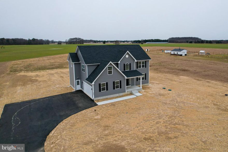 MOVE IN BY MARCH 2025! This beautiful new construction home offers 2,658± square feet of thoughtfully designed living space on a private 1.02-acre lot. Featuring 4 bedrooms and 2.5 baths, the home boasts a bright, open-concept layout ideal for modern living and effortless entertaining. The spacious family room with a gas fireplace flows seamlessly into the gourmet kitchen, complete with 42-inch soft-close cabinetry, a stainless steel appliance package with gas cooking, and elegant quartz countertops. A versatile flex space at the front of the home provides the perfect option for a formal dining room, home office, or additional living area. Step outside to the maintenance-free deck; perfect for outdoor dining, relaxing, or entertaining all while enjoying views of the expansive property. Upstairs, the generous primary suite serves as a true retreat, featuring a spa-like ensuite bath with a soaking tub, oversized shower, and double vanity, along with his-and-hers closets and a cozy nook ideal for a reading or sitting area. Three additional well-sized bedrooms, a full guest bath, and a convenient second-floor laundry complete the upper level. The full, unfinished walkout basement offers endless potential to finish for additional living space, a home gym, recreation room, workshop, or abundant storage. Ideally located with quick access to major routes and I-95, this home offers easy commuting while remaining close to Lums Pond State Park and the charm of historic Old New Castle. Call today to make this new construction home yours!