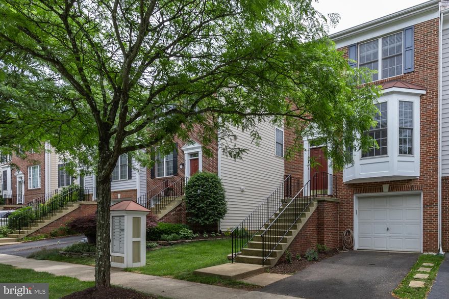 Beautiful end unit town home in sought after South Riding. This renovated home has 3 bedrooms, 2 full bathrooms, 1,910 finished square feet and an abundance of natural light and charm. Whole house remodel in 2017! Open concept living room and dining room, perfect for entertaining. Updated kitchen with quartz countertop, tile backsplash, center island, custom cabinets, newer appliances, cement tile flooring and a breakfast room. Large owner's suite with a walk-in closet, vaulted ceiling and updated ensuite bath with dual sink, vanity, frameless glass walk-in shower. Two additional bedrooms and one full updated bath on the upper level. Finished lower level with family room, gas fireplace, workshop, laundry, storage and half bath. Fenced yard with a deck and patio. Amazing community amenities include four swimming pools, two community buildings, basketball court, tennis courts, playground, walking trails, golf, picnic pavilion, skate board park, volleyball and more! Great Chantilly location close to restaurants, route 50, Loudoun County Parkway, and more!