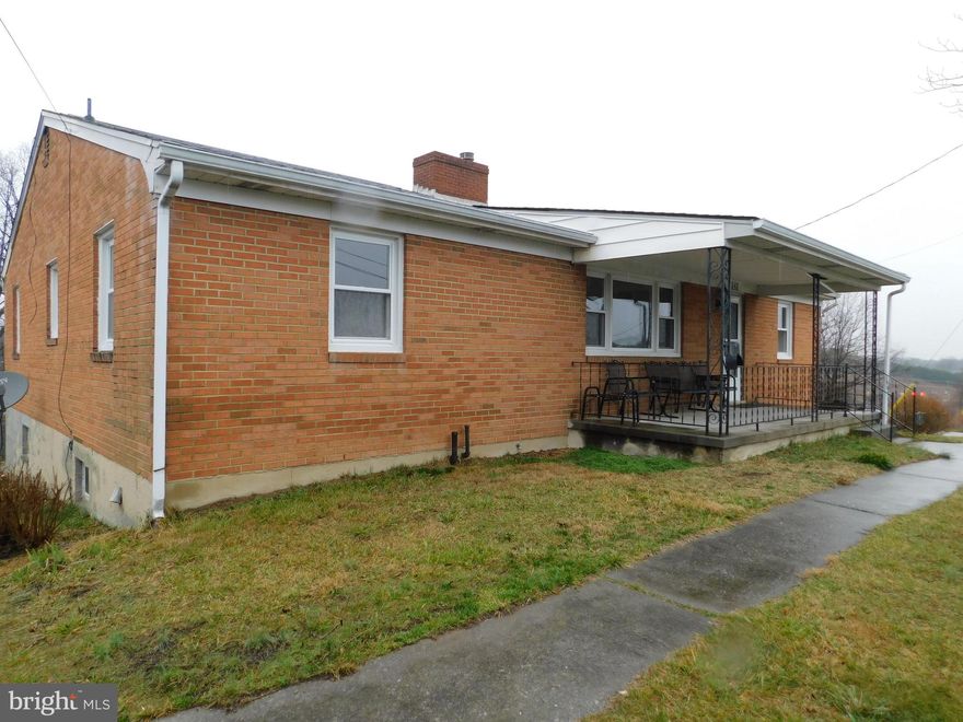 REMODELED KITCHEN including new lvp flooring, quiet close cabinets, counters, range, microwave and dishwasher!!  Brick raised ranch with full partially finished basement convenient to Routes 7, 50 &340 and I-81 & 66.  Near schools, shopping and parks.  Main level features hardwood floors, large living room w/fireplace (not to be used), separate dining room,   enclosed porch, master bedroom w/full bath and 2 additional bedrooms. Hallway has 2 large closets for extra storage.  Family room / office area in the large and open  partially finished walk-out basement with NEW laminate flooring, and a separate utility area. Central air conditioning, oil heat, public water and private septic.  Gravel driveway circles house and offers parking.   NO SMOKING  - including electronic smoking products.  $2295month.  Renters Insurance required  Minimum credit score of 650 is required  1 small dog (20lbs or less) will be considered with approved application, pet deposit and $50/month pet rent  NO CATS