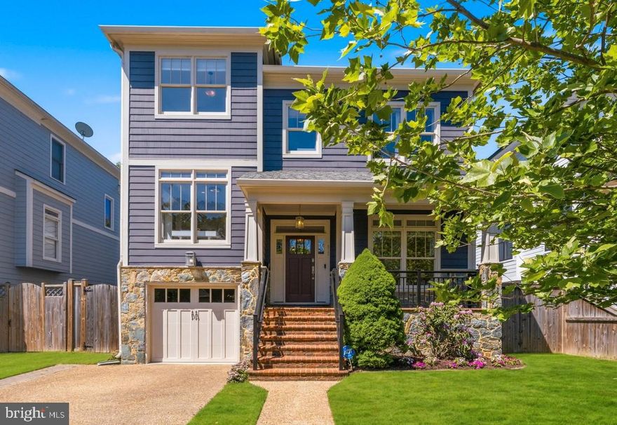 In the Heart of Arlington Just Blocks from VA Square Metro, Ballston & Clarendon! Welcome to this stunning, 2006 built stone and Hardie plank custom Craftsman Colonial, ideally located in the highly sought-after and historic Ashton Heights neighborhood. Nestled on a picturesque, tree-lined street, this Showman Homes built home offers the perfect blend of charm, custom architectural details and modern convenience—just moments from Metro, shops, dining, and parks. Gorgeous refinished hardwood floors, fresh paint finishes, custom built-ins, and refined architectural details elevate every space. Boasting three beautifully finished levels and offering 4,700 sq ft of living areas, this expansive residence features 5/6 bedrooms and 5.5 baths. Designed for both everyday living and entertaining, the charming covered front porch leads to the open-concept main level which showcases a seamless flow between the living room, dining room and the gourmet island kitchen. The adjoining breakfast area and family room open to the backyard deck and patio. Up a half flight of stairs, the office/bedroom offers custom built-ins and features French doors opening to a main level overlook. Four spacious bedrooms, four full baths (each bedroom has its own bath!) and a bedroom level laundry room all highlight the upper levels. Don’t miss the luxurious primary suite, a true retreat, complete with 10’5” tray ceiling, a cozy fireplace, walk-in closet and a spa-inspired bath with heated floors, jetted garden soaking tub, glass enclosed shower and dual vanity sinks.
The fully finished daylight lower level includes a private home theatre media room offering the ultimate movie-night experience, along with a spacious recreation room with wet bar, an additional bedroom, full bath and copious storage. This flexible living space would also make a great in-law, teen or nanny suite. A front load garage completes the package. Step outside and enjoy an outdoor oasis with extensive backyard flagstone patio, fenced rear yard and space for relaxing, gardening, or hosting gatherings. Enjoy the serene residential feel of Ashton Heights while being exceptionally close to Metro, Clarendon, and Ballston. Whether you’re commuting into Washington, DC, enjoying nearby neighborhood amenities, or simply looking for a place to call home, this property delivers. Arlington living at its finest—classic craftsmanship, modern amenities, and an unbeatable location!