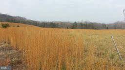 Lot 3 is 1.78 cleared usable acres with country views of Mountains and pasture. Current septic permit. Possible seller financing with only 15% down. Call for complete details. No mobiles. Just off Route 13 in the country. Several parcels for sale - Under agriculture for hay fields currently.