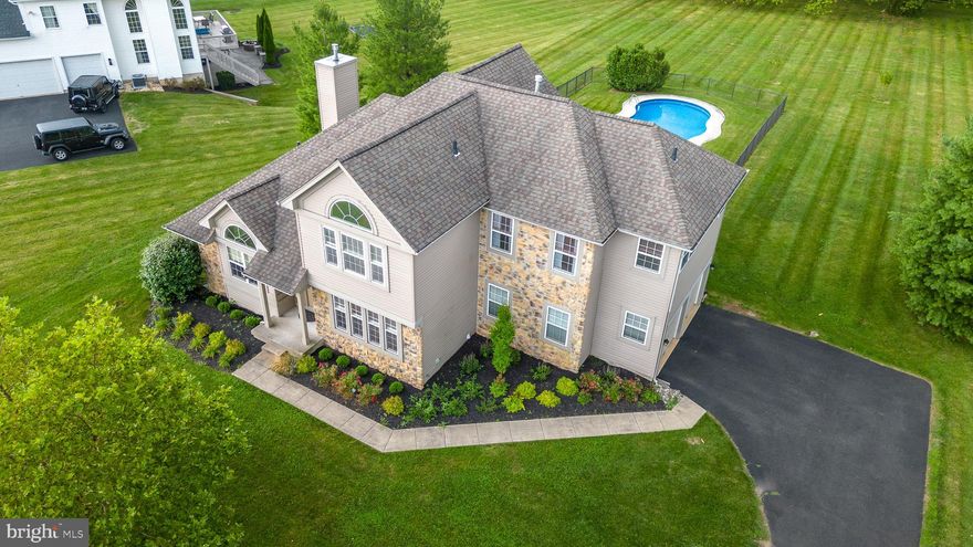 Are you looking for a spacious and bright home situated on a sprawling one acre lot, and featuring a fantastic inground swimming pool ready for your Summer enjoyment? As you pull into Breezy Hollow Drive you will notice the long distance views and rolling Buck County countryside before you in this quiet neighborhood.  Pull into the driveway and be greeted with a fabulous stone and siding maintenance free home with amazing curb appeal and new landscaping. This wonderful home is waiting for you, offering a open concept floor plan with a soaring two story foyer, stunning staircase, and nine foot ceilings. The first floor has been freshly painted a trendy Benjamin Moore Revere Pewter and has newer luxury vinyl flooring.  A formal living room is just off the foyer with vaulted ceiling and loads of windows to let the light spill in. Also off the foyer is a formal dining room featuring a bank of windows. The heart of the home is the newly remodeled kitchen featuring solid wood cabinetry, granite counters, stainless steel appliances, huge walk-in pantry closet, and a cozy breakfast room overlooking the backyard. Just off the kitchen is the two story family room drenched in sunlight and featuring a gorgeous gas fireplace with hearth, the perfect place to snuggle up on a cold winter night.There is also a renovated powder room and a sizable laundry room that leads you out to the oversized 2 car garage.  The  rear yard is accessible from the sliding door leading you to a huge maintenance free deck overlooking your backyard oasis. Just a short walk through the newly fenced area is your inground swimming pool with new liner and filtration system. Invite all your friends and family over for your next big picnic to enjoy the Summer and beyond. The yard offers so much space to add swing sets, a gardeners paradise, family baseball or soccer games, the ideas are endless. Step back inside and head upstairs to a wide open hallway overlooking the foyer and family room. The primary bedroom suite features a cozy sitting area, a large walk-in closet, and a well appointed bathroom with double vanity, soaking tub, shower and a private toilet closet.
The second bedroom features a palladium window and vaulted ceilings, large closet, and ceiling fan. Bedrooms 3 and 4 are also spacious with large closets and all share the full hall bathroom. The basement is ready for you to finish which will give you so much more additional living space for extra entertaining or just to enjoy. Additional features of this fine home include: roof replacement with CertainTeed 5 Star plus shingles with 50 year transferable warranty, heater and air conditioner replaced in 2016 (still under warranty), and newer hot water heater. Located just minutes to shopping and major roadways for easy travel, and located in the highly rated Central Bucks School District, this is the perfect place to call home.  A one year home warranty included with purchase!