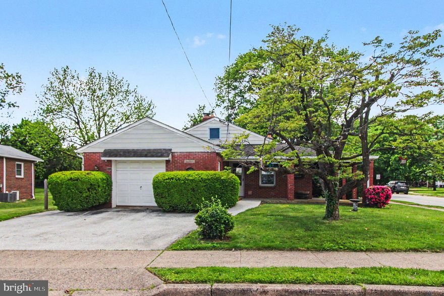 Welcome to this spacious brick ranch home in desirable Phoenixville offering true one-floor living with no steps to entry for added accessibility and convenience. This well-maintained vintage home features a bright living room with a large picture window and classic brick fireplace (unused for many years). The eat-in kitchen provides ample cabinet and counter space along with a dining area and potential for a center island.
Down the hall you’ll find a convenient powder room, a full hall bath with tub, stall shower and oversized vanity, plus 3 generously sized bedrooms. An additional flex room offers endless possibilities as a nursery, home office, dressing room, or walk-in closet. The living room, hallway and bedrooms all have original hardwood flooring. Ample storage space in the walk up attic. Central air in the summer and cozy radiator heat in the winter. The oversized attached garage also serves as the laundry and utility area with plenty of additional storage space. Enjoy outdoor living on the wraparound front and side porch overlooking the yard with existing storage shed. Conveniently located close to everything Phoenixville has to offer including the Schuylkill River Trail, recreation center, library, senior center, popular restaurants, breweries, shopping, and vibrant downtown attractions. Inspections are welcome; home is being sold as-is.
