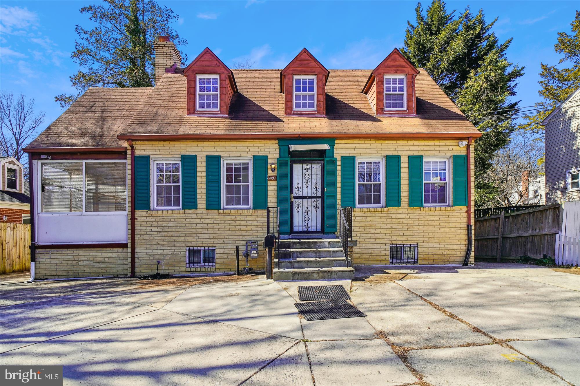 With 2900 square feet of space over 3 levels, this home is well-sized and suited to many different uses, including large extended family, home businesses, and is eligible for special financing for owner-occupants. Need more space; it's possible to add onto the rear of the house with this large lot. Located in the City of Takoma Park, this 1943 Cape Cod is a short stroll from a future Purple Line Station ( Coming in 2027) and on the M60 and M6X (formerly K6 and K9) bus routes (bus stop in front of the house) to Fort Totten Red Line Metro Station. Walk across the road to the famous IHOP Diner, the Caribbean Market, and Aldi's is up the hill. What a convenient location, with Sligo Park hiking/biking trails that run for miles just down the hill, connecting to the DC Bike Beltway - nature and exercise at your doorstep.
The versatile layout has a bathroom on each level (and 2.5 on the main level) and two in-law suites with kitchenettes. It's a great home for extended family or friends who want to buy together. There's a bedroom on each level and two big ones up top. The large living room has a wood-burning fireplace with a mantel. A separate dining room is next to the kitchen. Gas cooking is featured along with granite countertops. Easy parking for up to 6 cars in front and additional street parking. The back has a huge deck across it to enjoy. The sale includes brand-new solar panels on the rear roof that cost $32,000 and are conveyed with the property. There is an EV car charger on the right side of the parking area that also conveys. Things are looking greener, and the large rear-fenced yard is ready for your gardening ideas. It is a sunny spot - ideal for a vegetable garden with flower beds surrounding it.
Certain types of home businesses are allowed - the zoning is single-family residential, but previously, there was a license to have a tax business sign here. Permitted uses under this zoning include daycare, Residential Care, and Religious Assembly. The street has a good traffic count and a side road for easier parking.
This home is currently eligible for a Grant Program by a local bank of up to $10,000 toward purchasing a Primary residence that may be used for down payment, closing costs, and prepaid items at closing. The grant has an income limit of $186,950 and a minimum down payment of 3% with NO Private Mortgage Insurance (PMI), which is a big monthly savings to you. The minimum credit score for this grant loan is 620. Please contact the listing agent for details.
There is a Farmer's Market on nearby Anne Street once a week, and a wide range of international dining and grocery stores within walking distance. This home could use some cosmetic updates, but it is versatile and solid, with gas heating and electric central cooling. Solar panels and an EV Charger; it is great for friends or extended family with multiple levels, bathrooms, and kitchenettes. Also, a chance to operate your home business and be on-site.. Fast closing is possible on this versatile home. Visit soon with your planning book and see how this home can be the answer to personal and business needs.