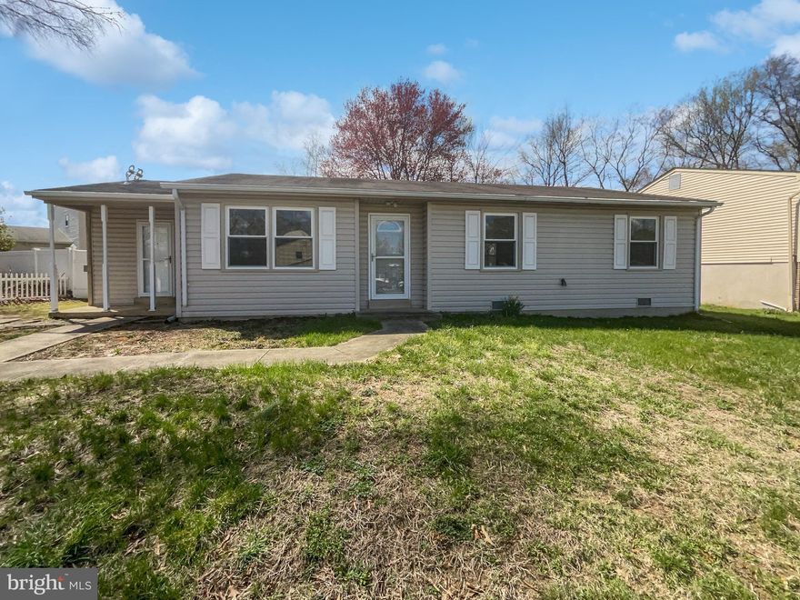 Move-in ready single-level rambler offering 3 bedrooms and 2 full baths with fresh interior paint and neutral finishes throughout. Enjoy an updated kitchen featuring granite countertops, stainless steel appliances, and plenty of space for everyday meals or entertaining. Step outside to a fully fenced yard—ideal for relaxing, pets, and play. Conveniently located within minutes of the DMV corridor, with easy access to shopping, dining, and popular sports and entertainment venues.